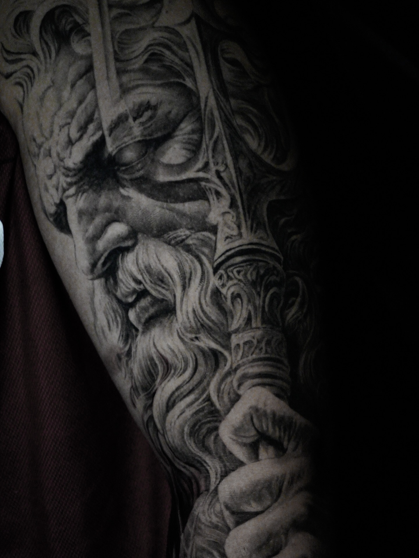 Bearded man with sword realism tattoo on the forearm by Elisha Kane