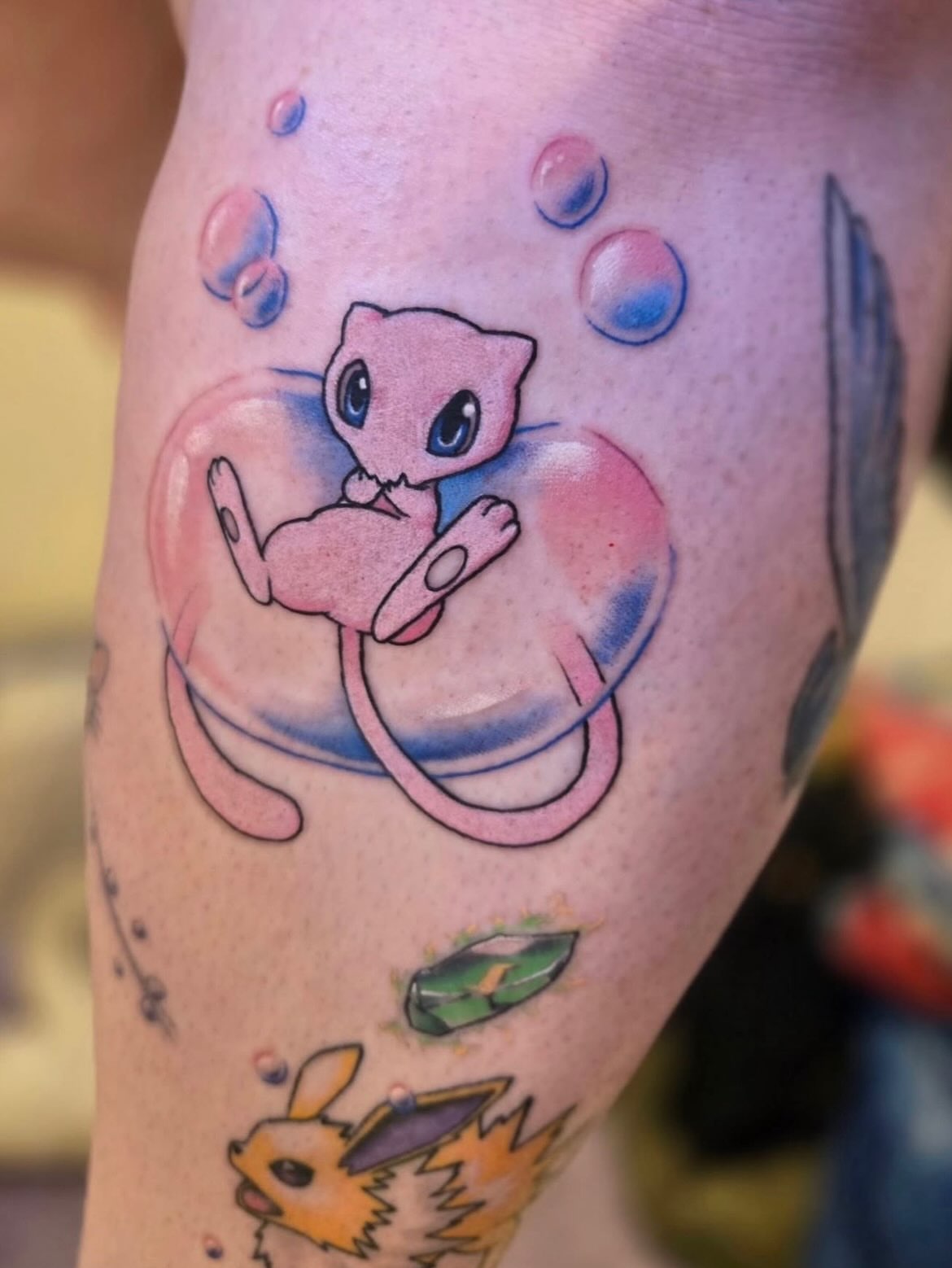Mew dotwork tattoo on the forearm by Tattoos by Fesik LLC
