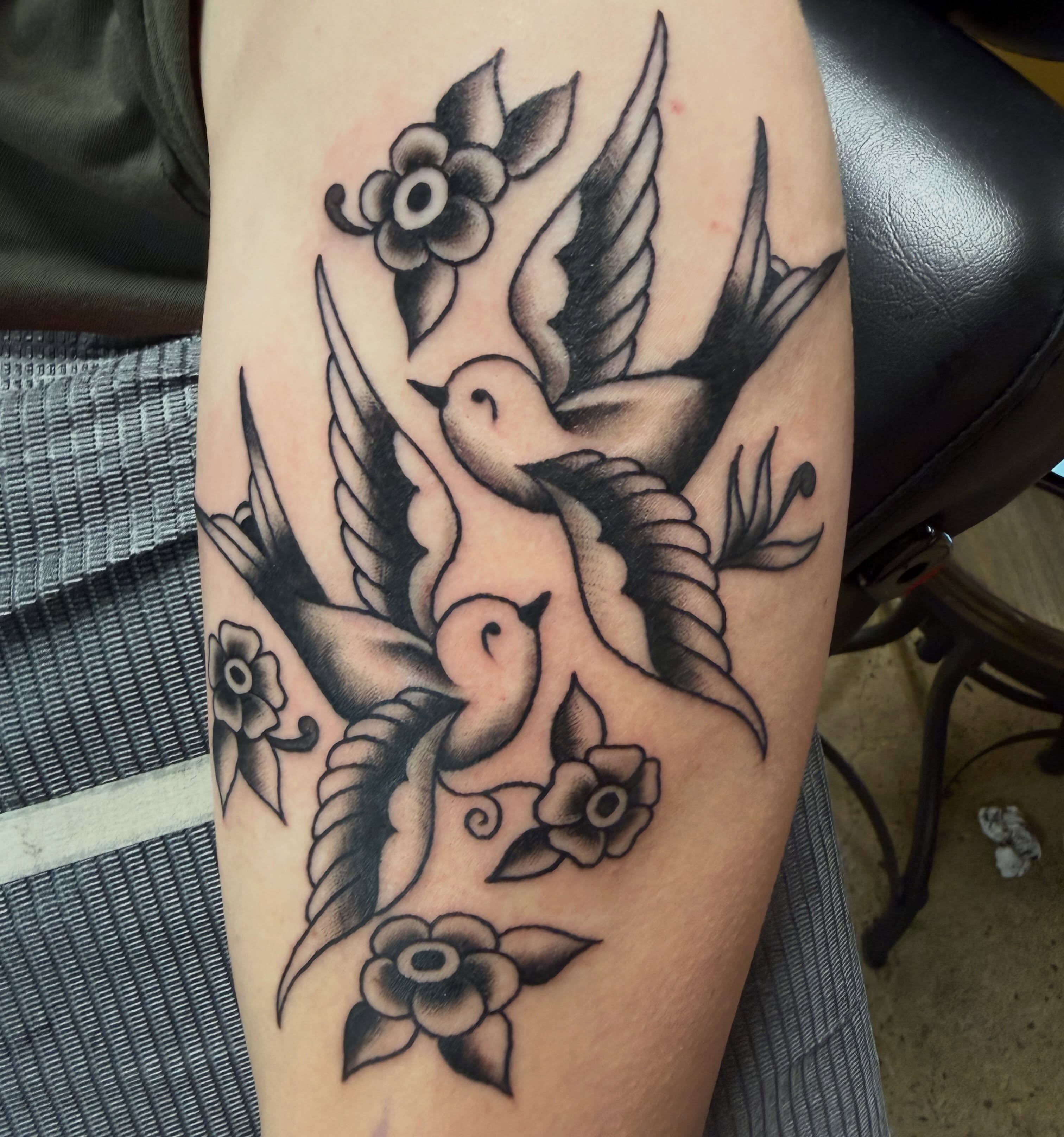 Swallows and flowers American traditional tattoo on the forearm by ★ eliza rodriguez🇲🇽 ★