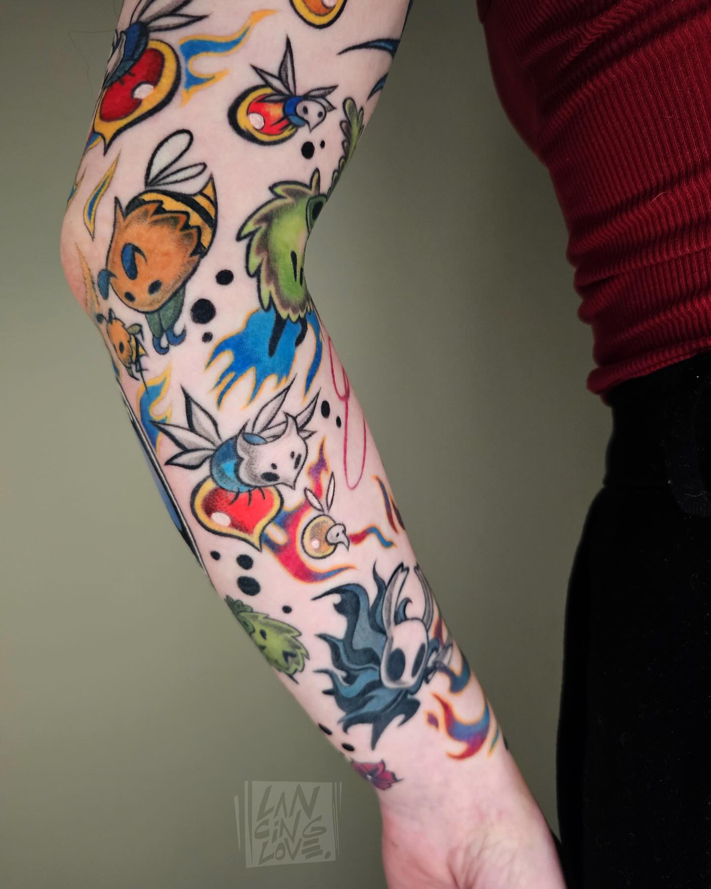 Anime characters anime tattoo on the forearm by Lancinglove