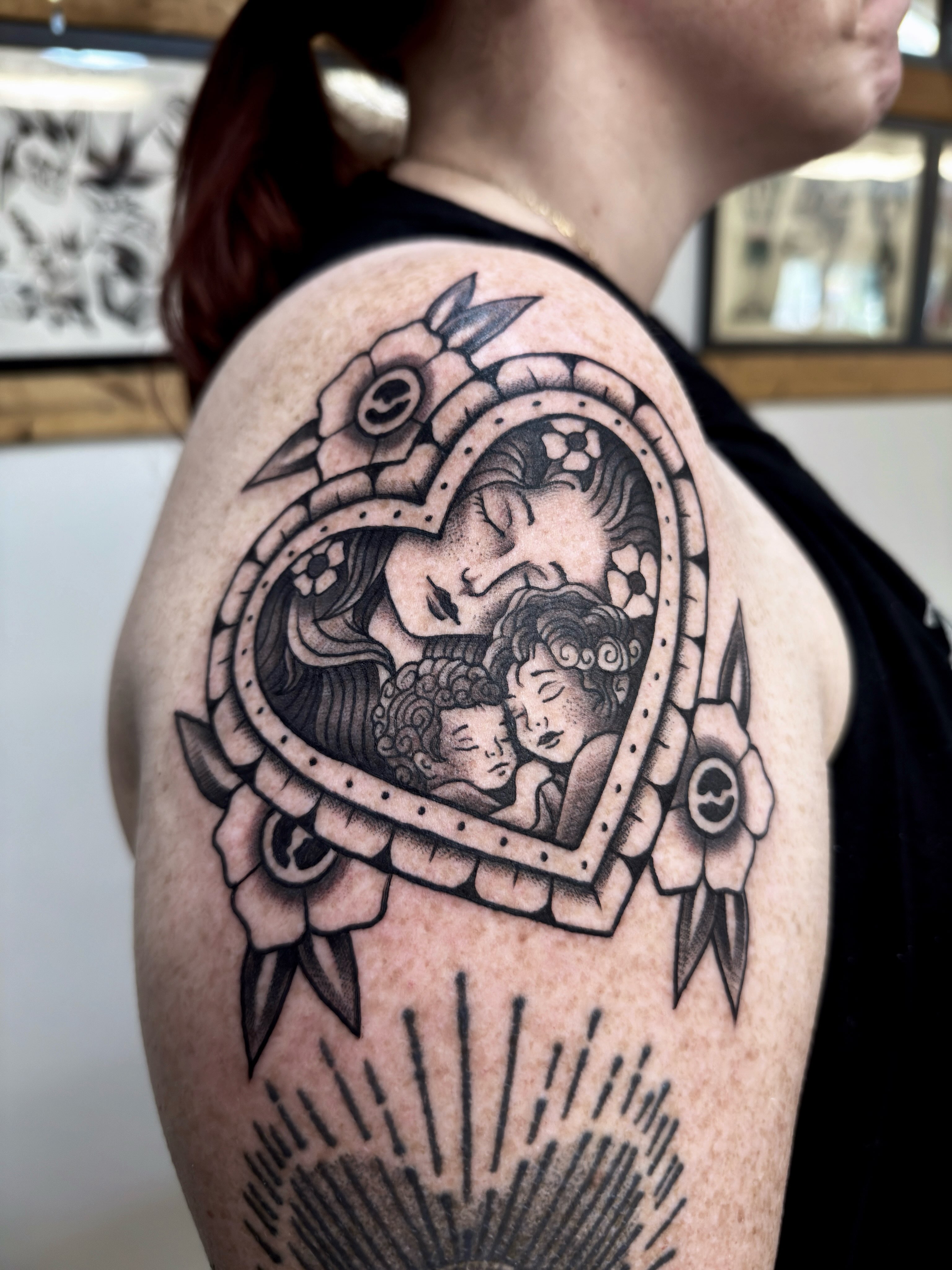 Mother and children American traditional tattoo on the shoulder by Trav, Bayville, New Jersey