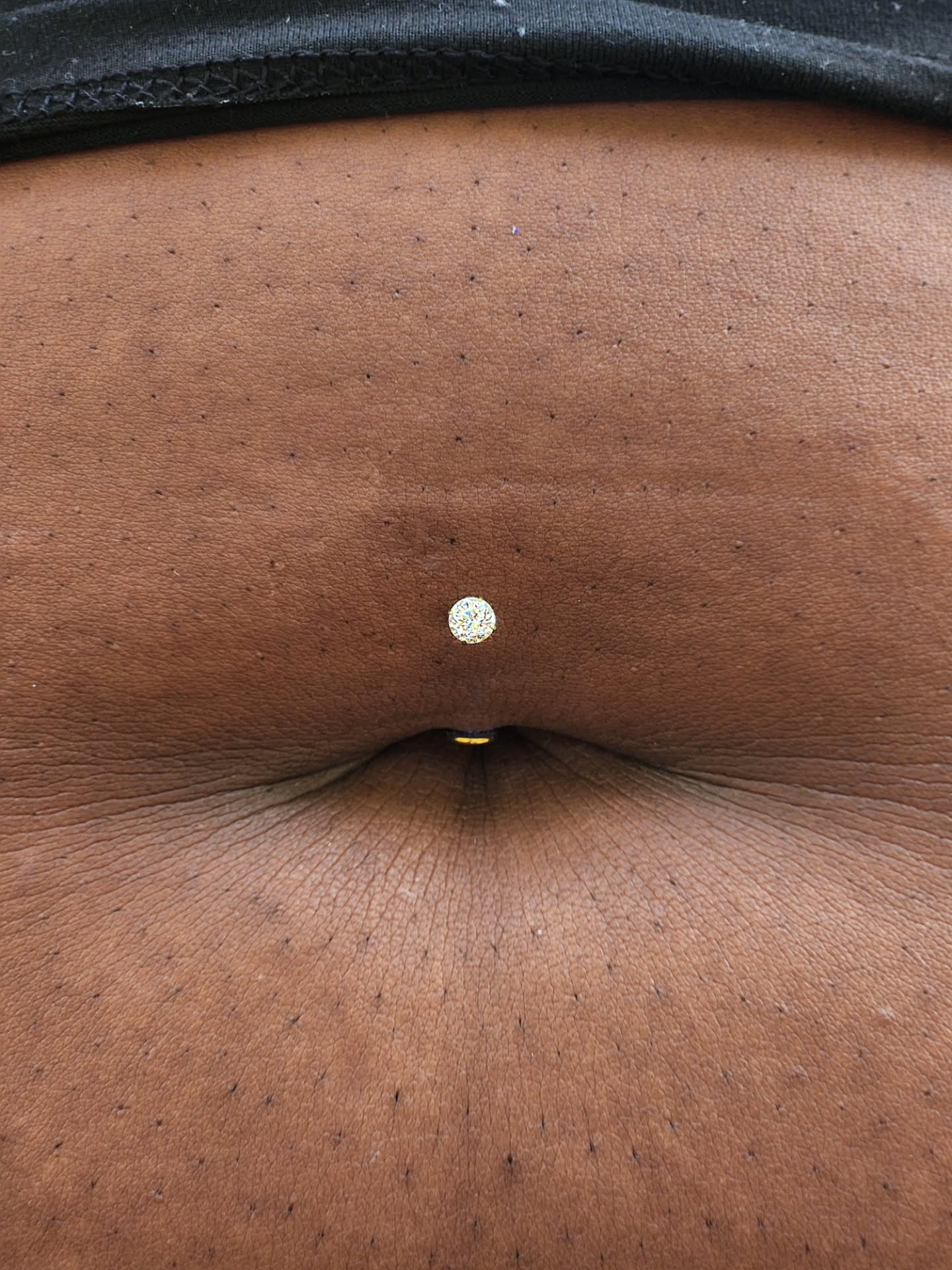 Nipple piercing dotwork tattoo on the torso by Madison Fleishman, Southampton, Pennsylvania