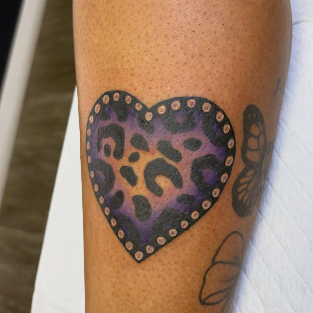 Heart dotwork tattoo on the forearm by Hailey Hermosillo