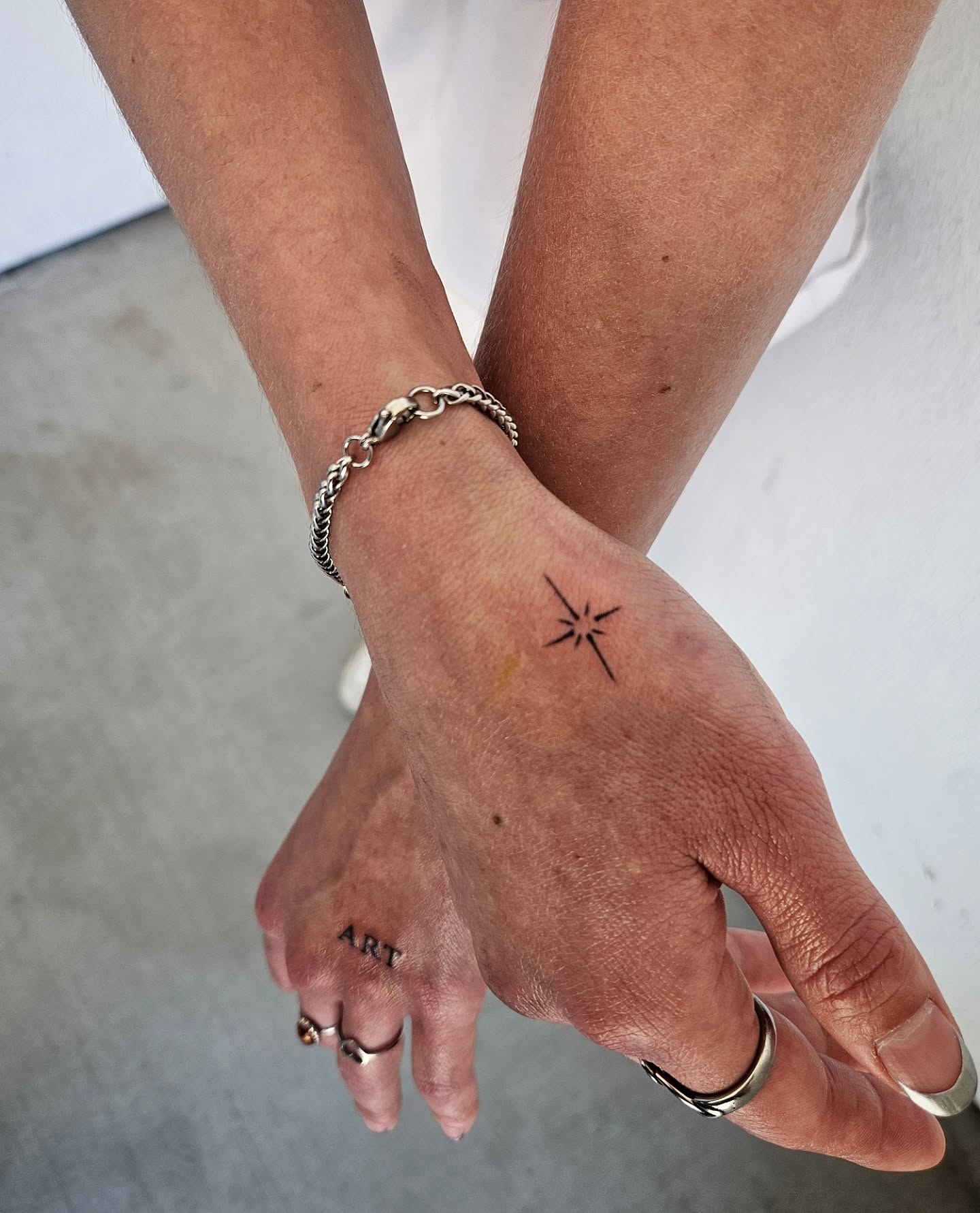 Star geometric tattoo on the hand by Lina ๐ป