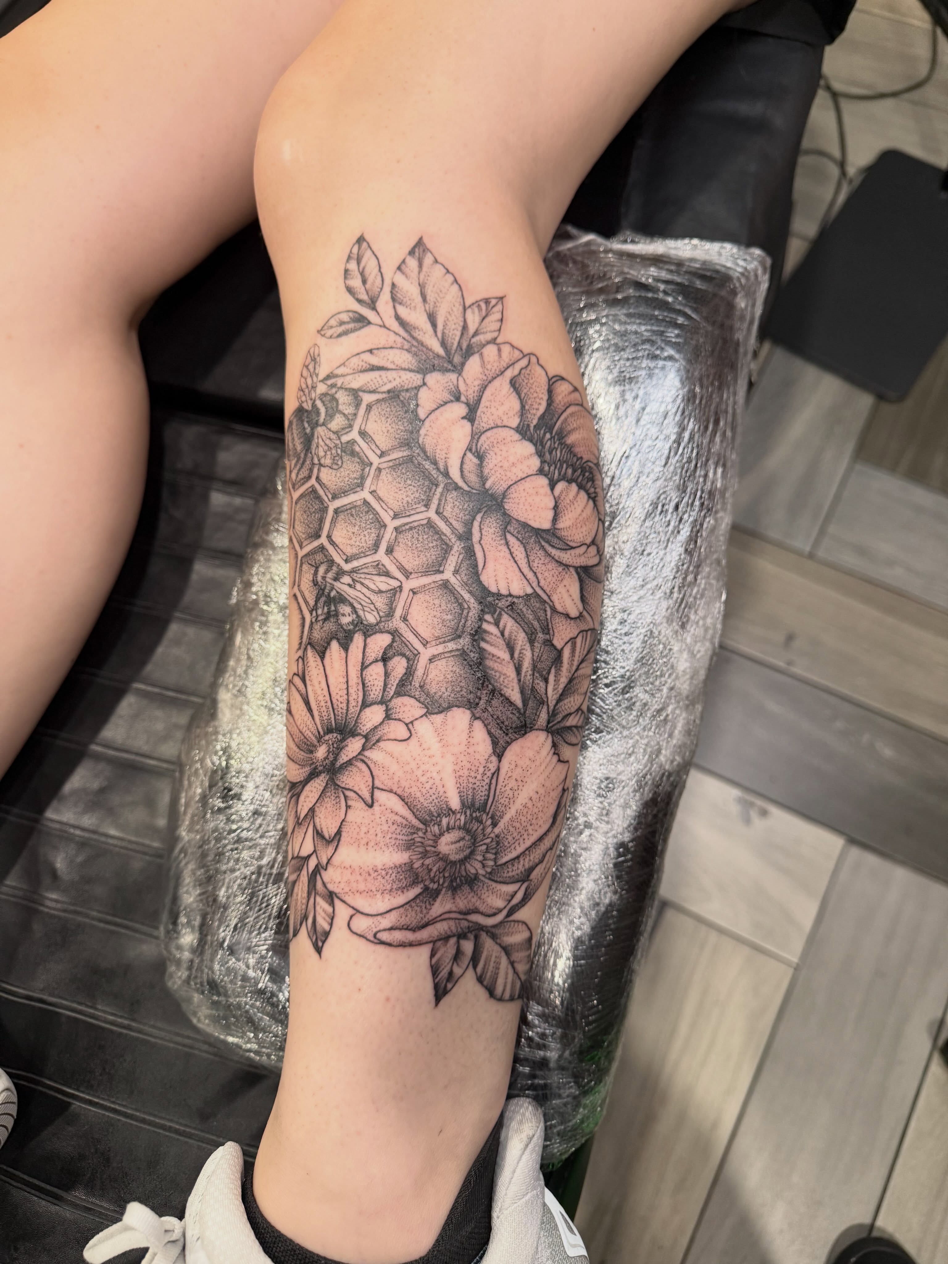 Floral bouquet realism tattoo on the forearm by Dave Potavin, Erlanger, Kentucky