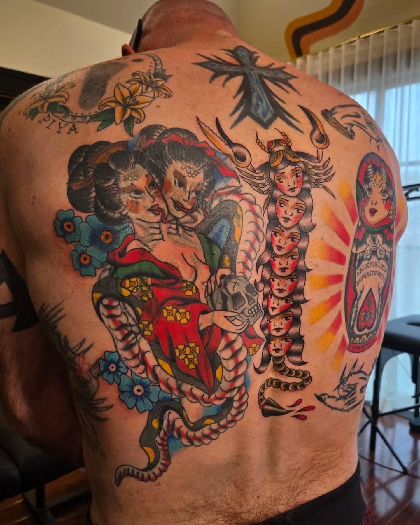 Geisha and snake American traditional tattoo on the back by jo(rdan)