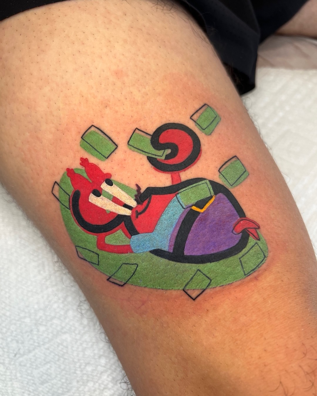 Abstract figure geometric tattoo on the thigh by Tattoo Artist