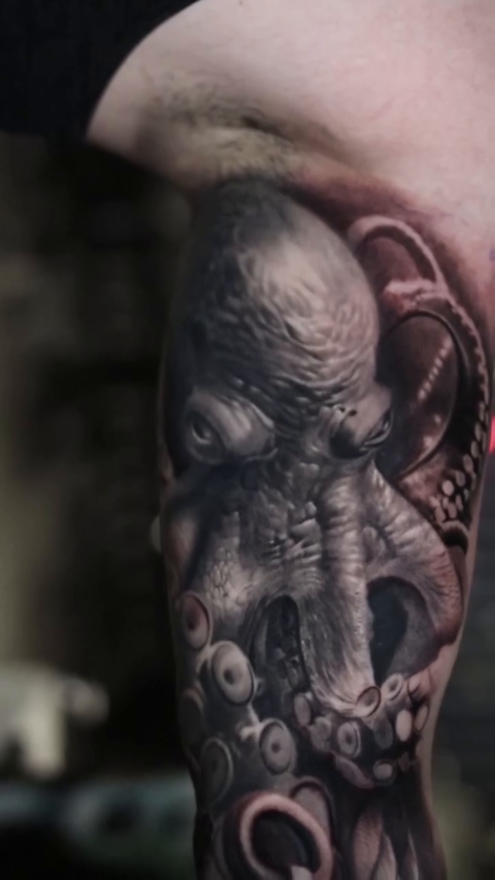 Octopus with dog tags realism tattoo by Martin Reyes Jr