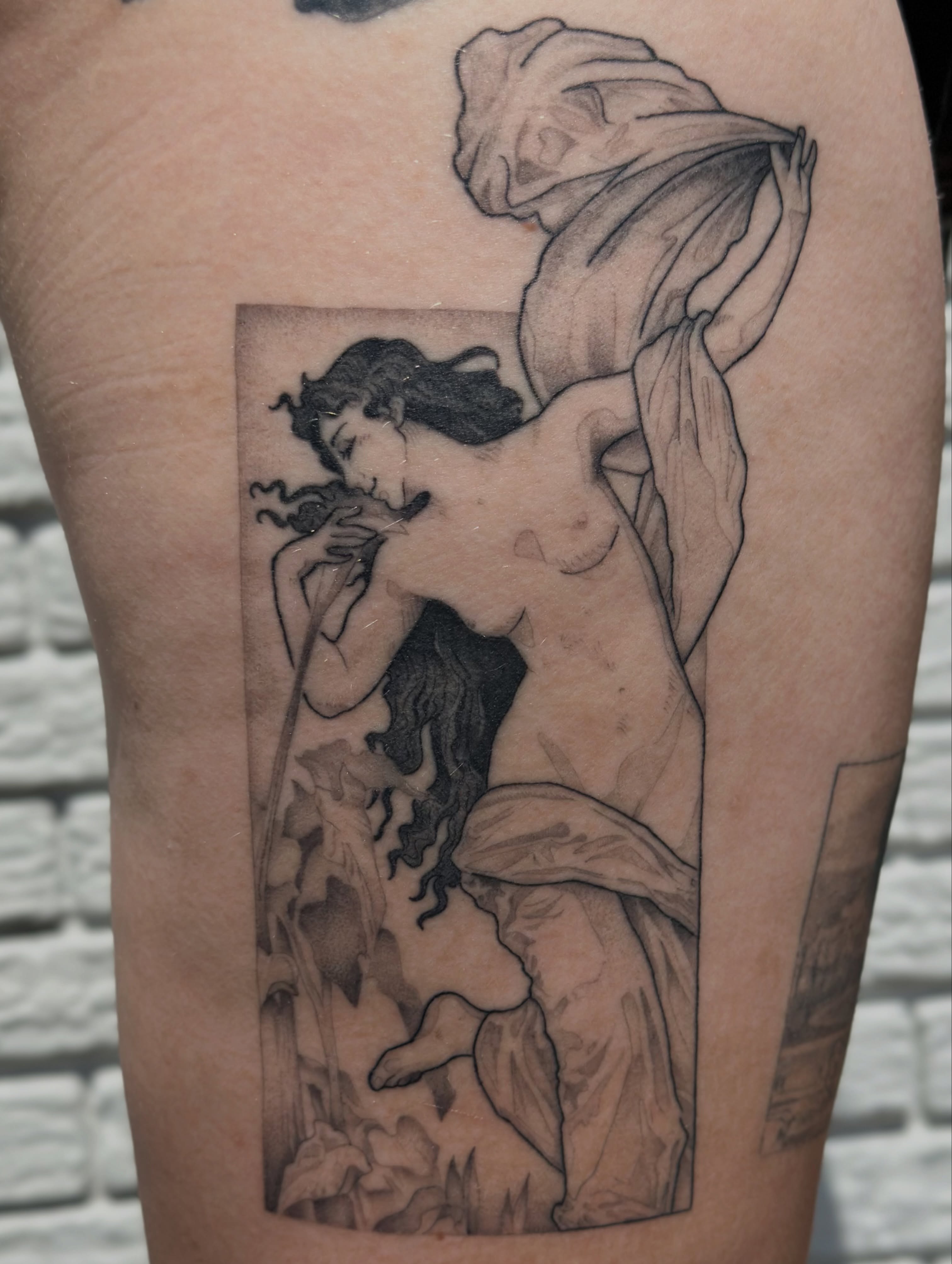 Nude woman with flowing robe realism tattoo on the thigh by TATTOOLIZARD (James)