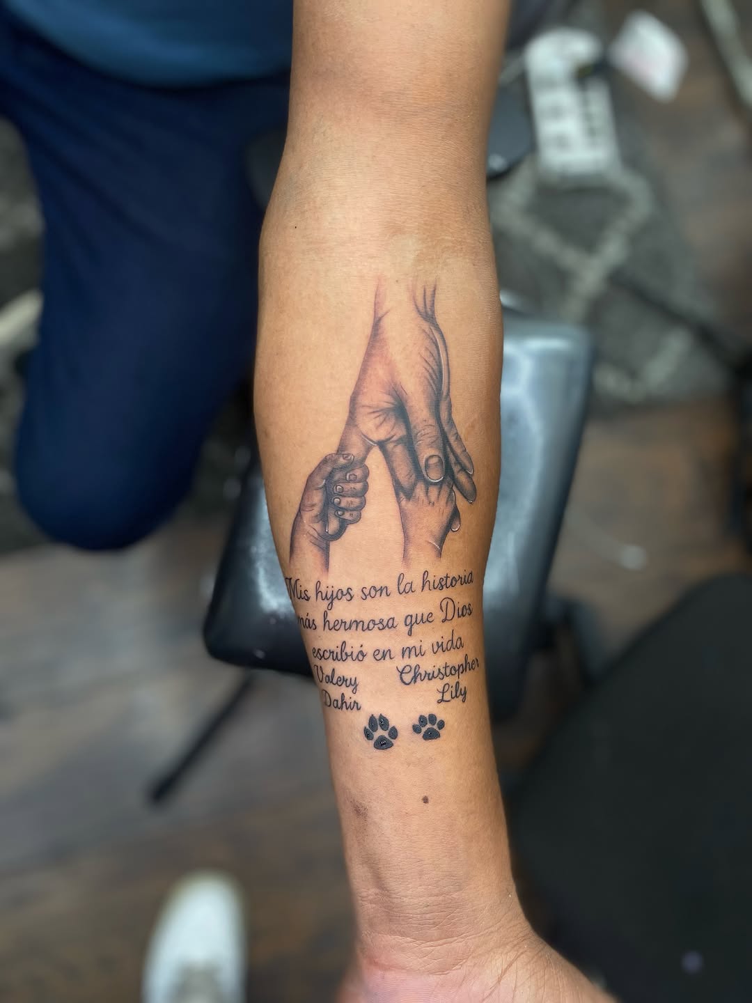 Hands and quote realism tattoo on the forearm by Irving Guzman