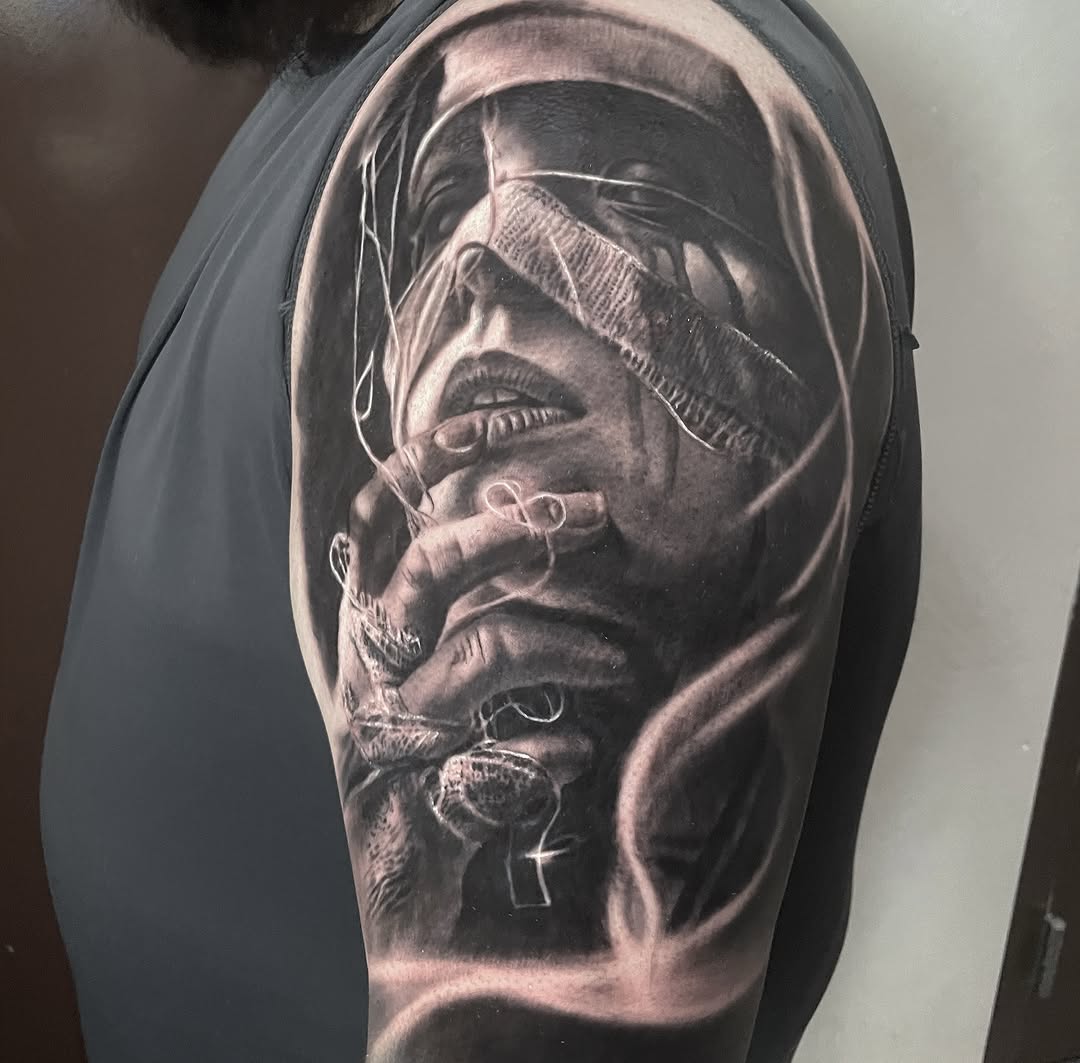 Tattoo by @kaostattooart — realism, black_and_grey