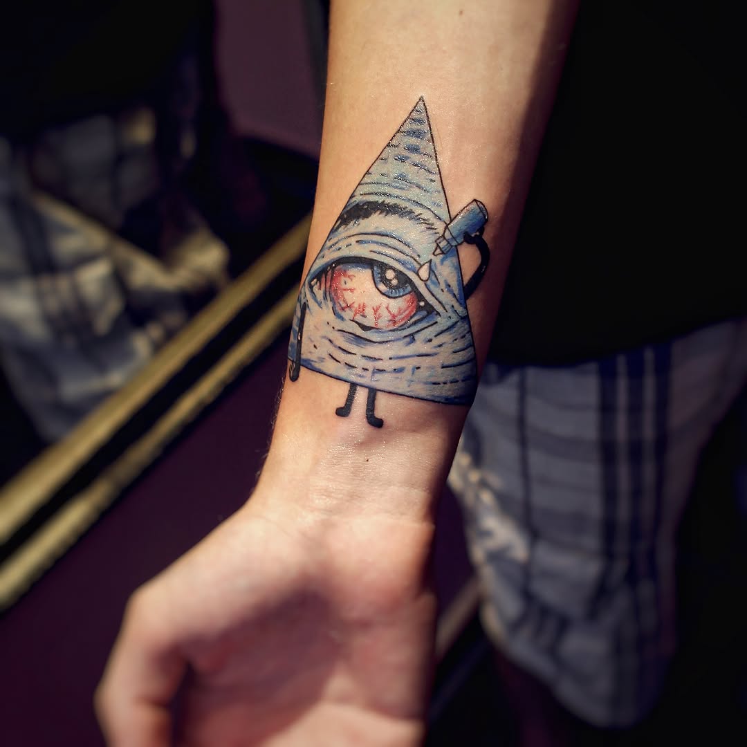 All-seeing eye triangle with eye dark art tattoo on the forearm by Yana Aizen