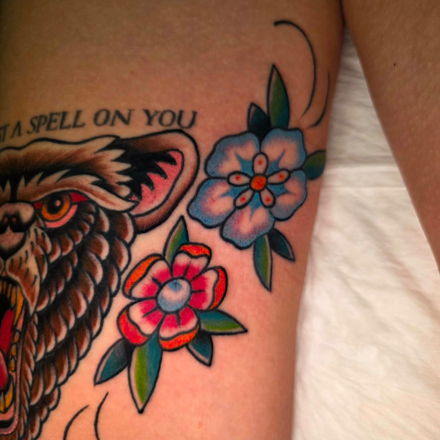 Owl and flowers American traditional tattoo on the thigh by Jenni Hand - Tattoo, Maryville, Tennessee