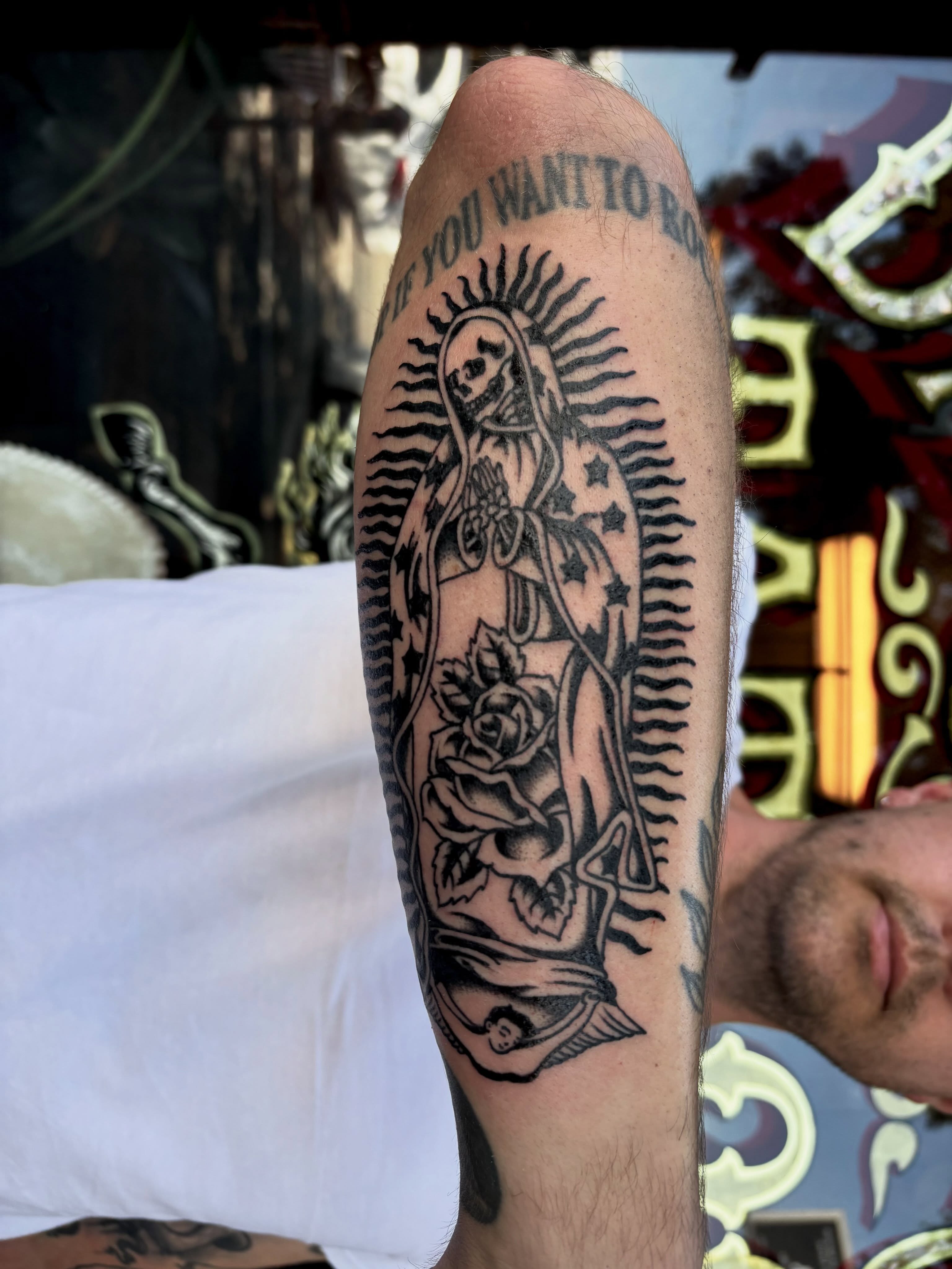 Skeleton and roses black and grey tattoo on the forearm by Alyssa L'Heureux🕴🏼, Los Angeles, California