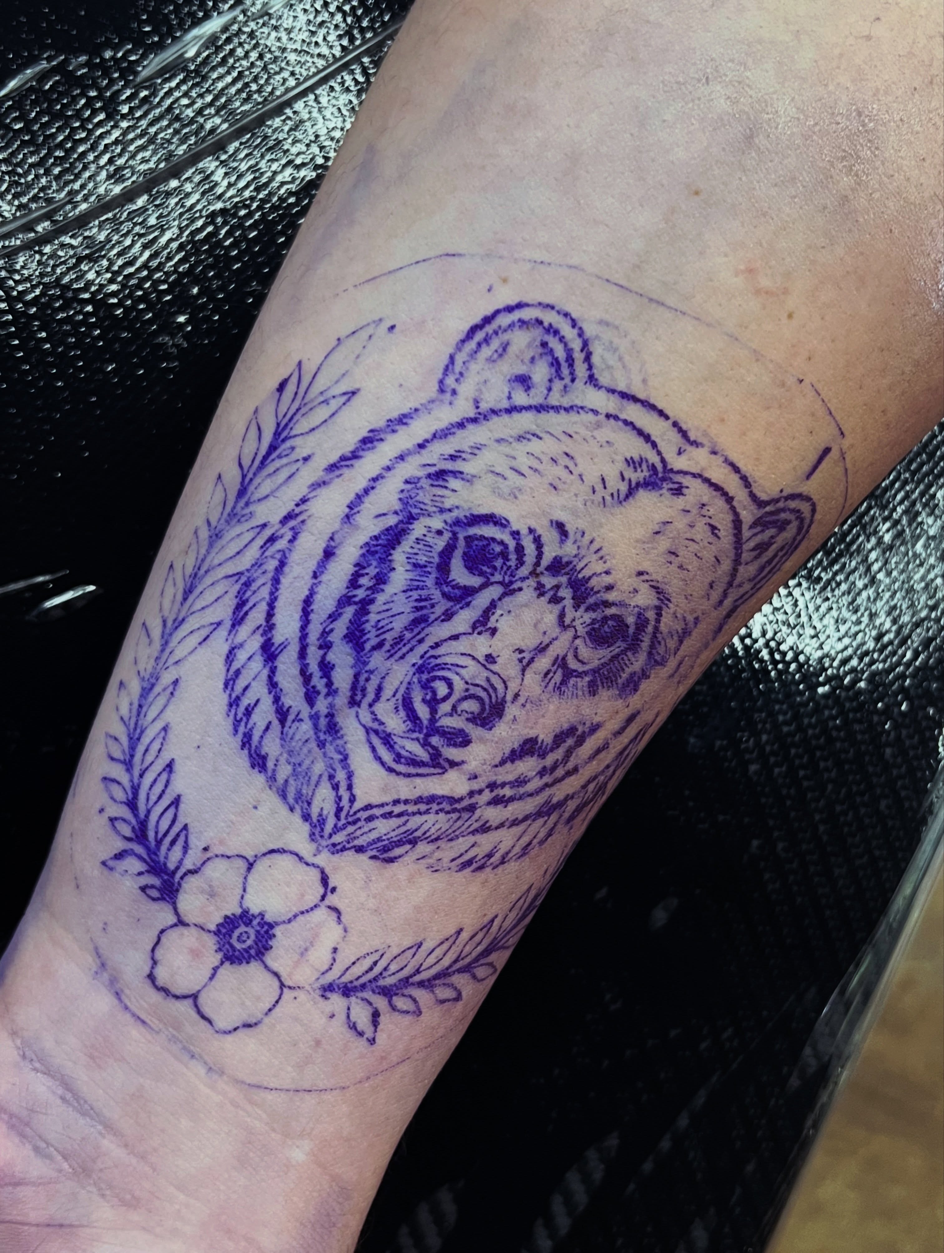 Bear head realism tattoo on the forearm by Evan Intveld