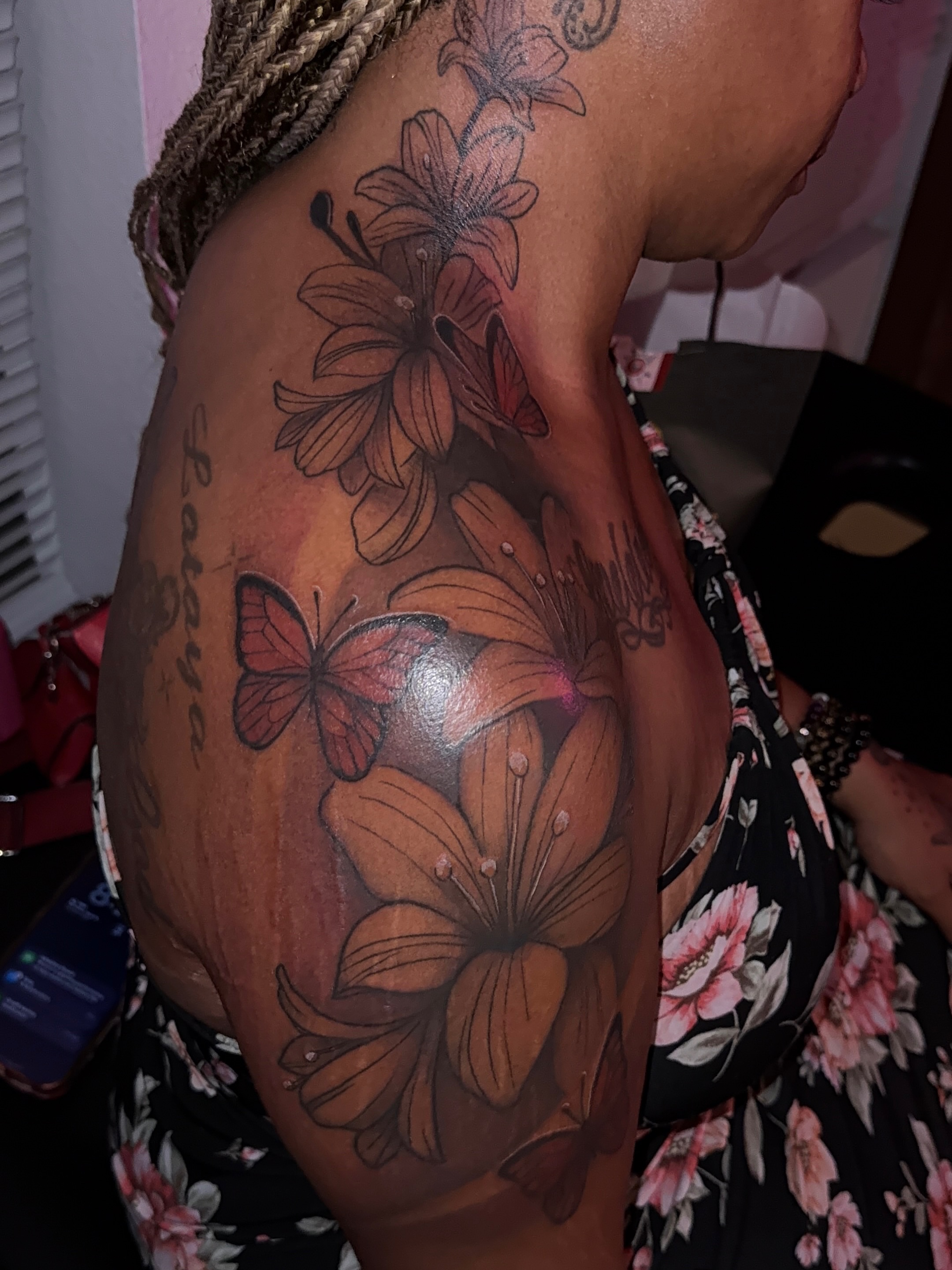 Flowers and butterflies realism tattoo on the thigh by XoticTherapy, Las Vegas, Nevada