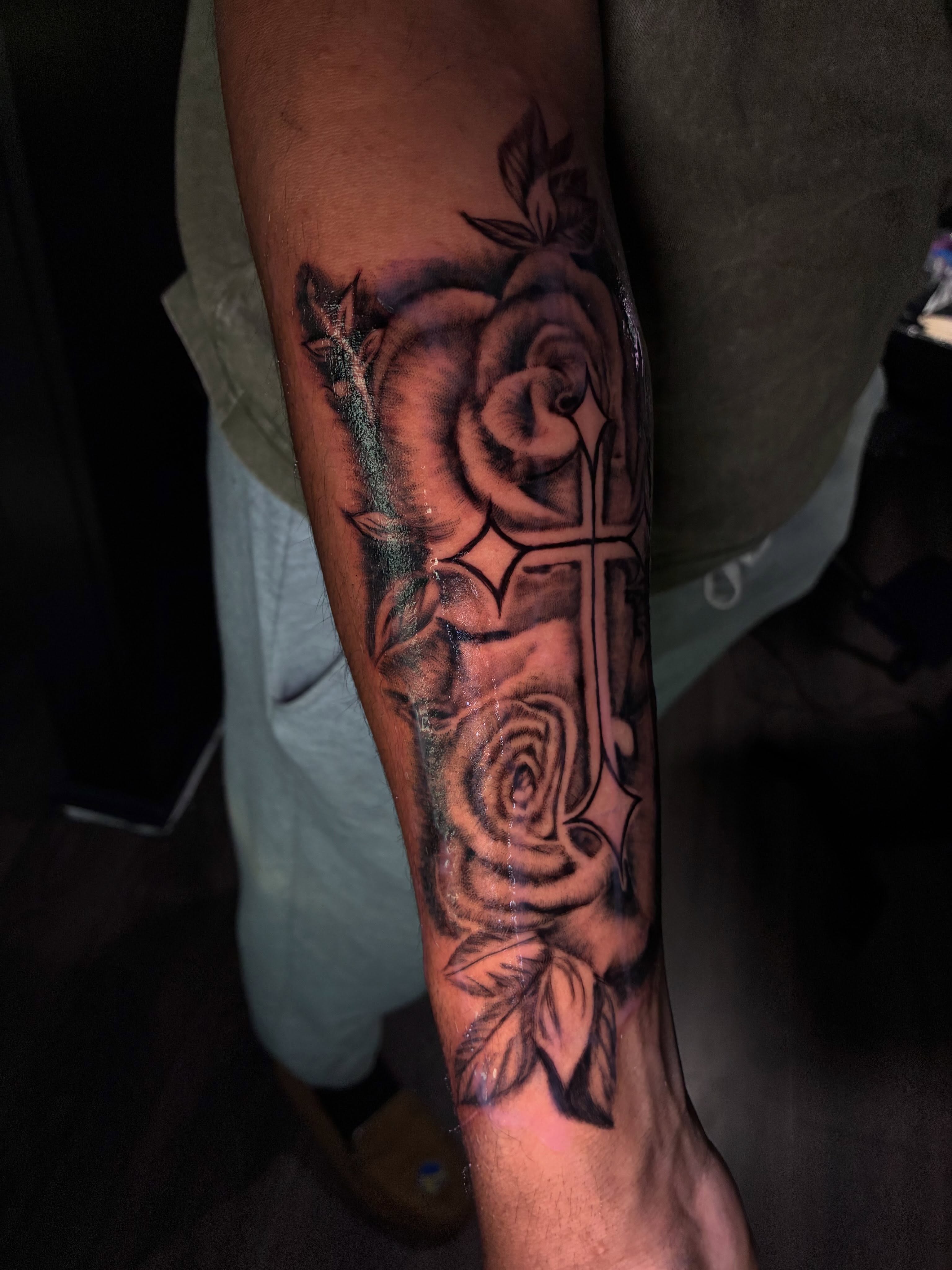 Roses and cross black and grey tattoo on the forearm by Ink’d by Reina 🖤, Colorado Springs, Colorado