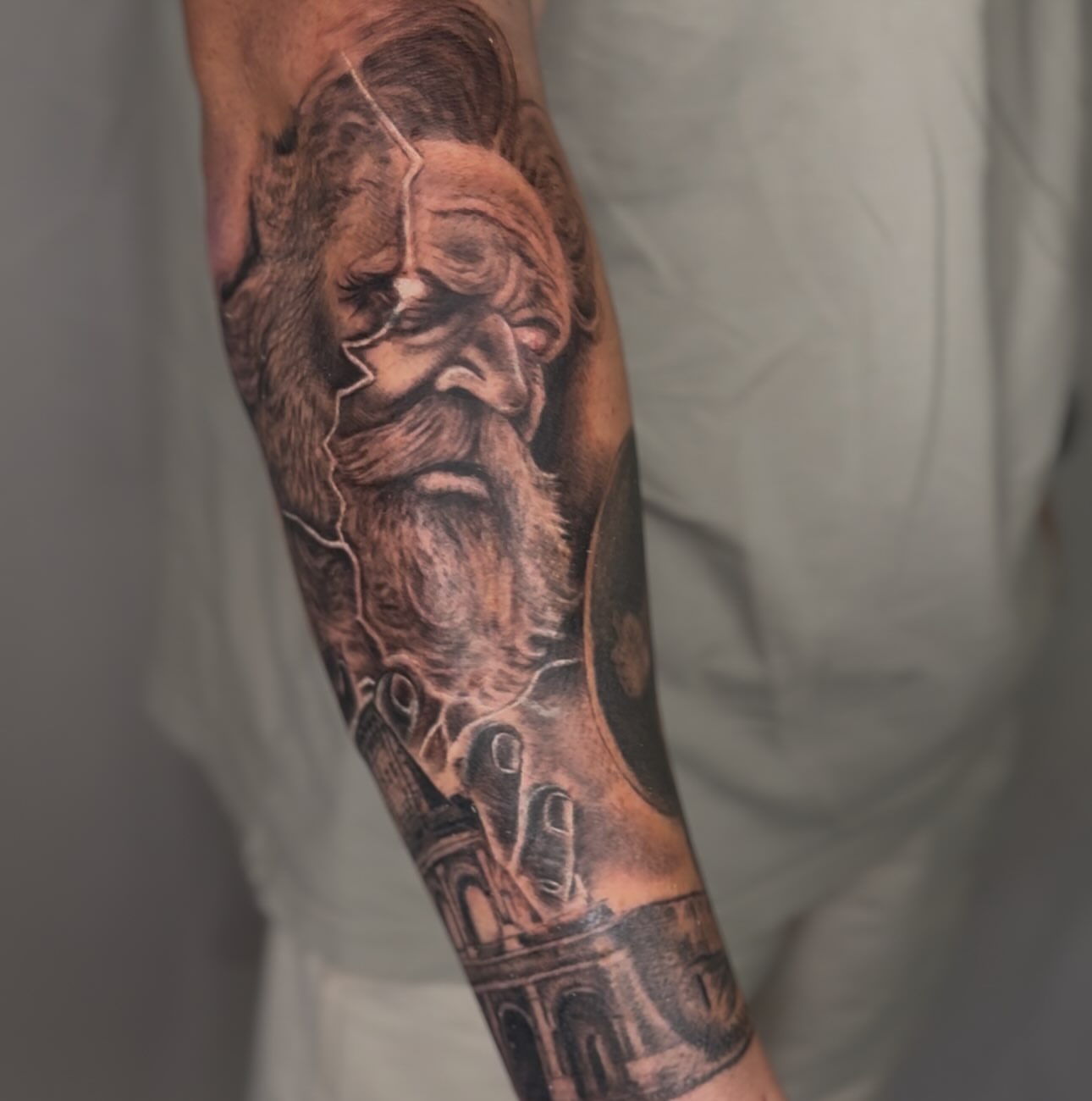 Old man realism tattoo on the forearm by Elmer Lethco