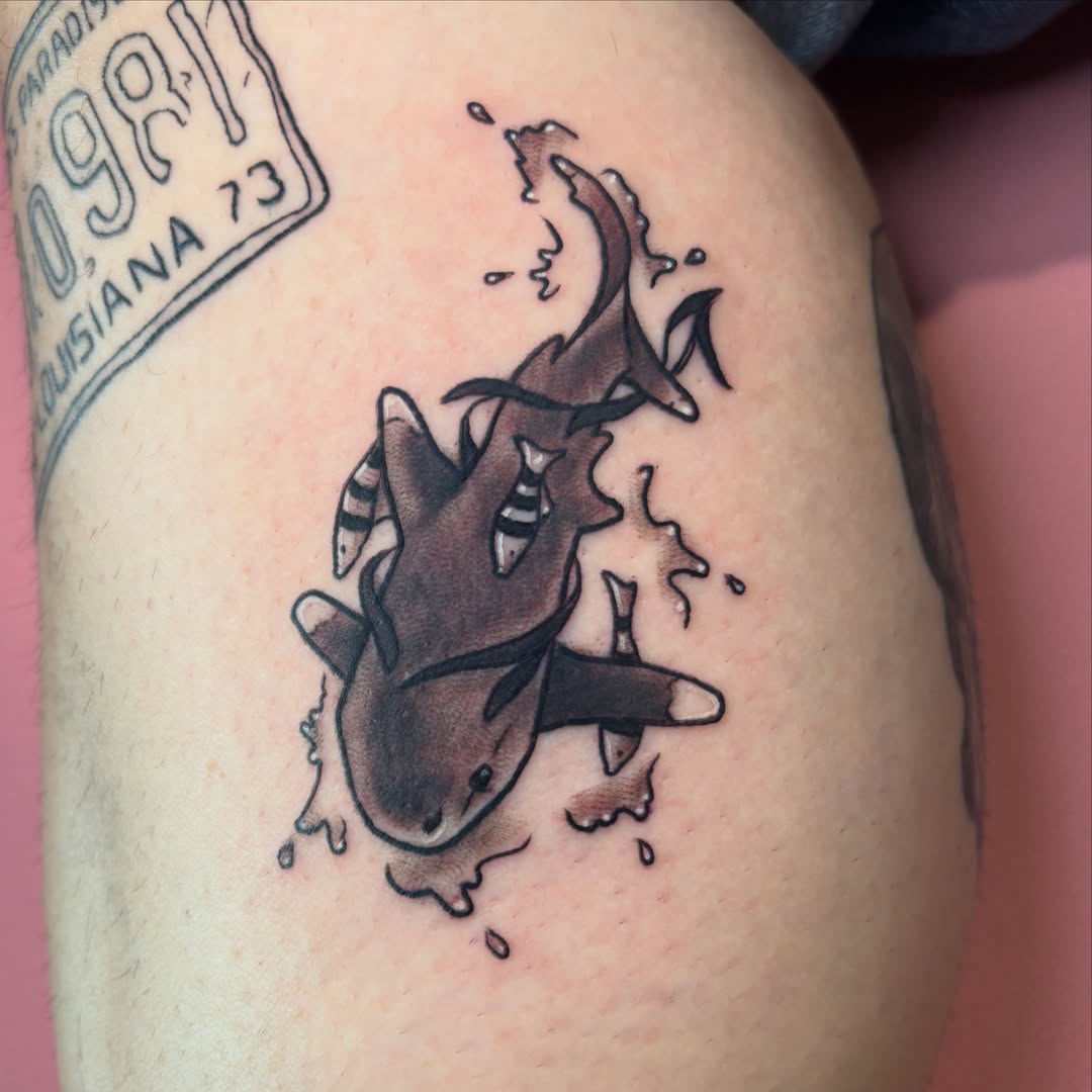 Shark black and grey tattoo on the upper arm by Bekah Smith