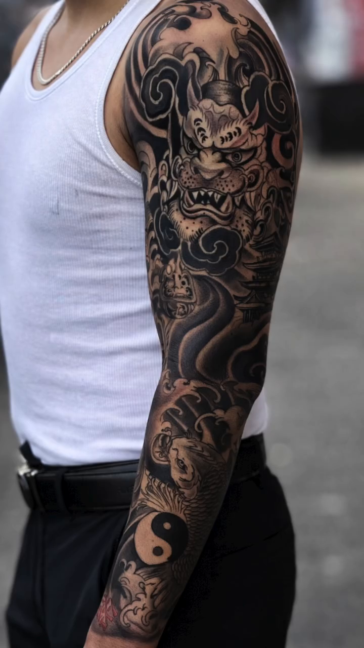 Dragon and waves sleeve Japanese tattoo on the forearm by Andres Calvo🇺🇸🇨🇴