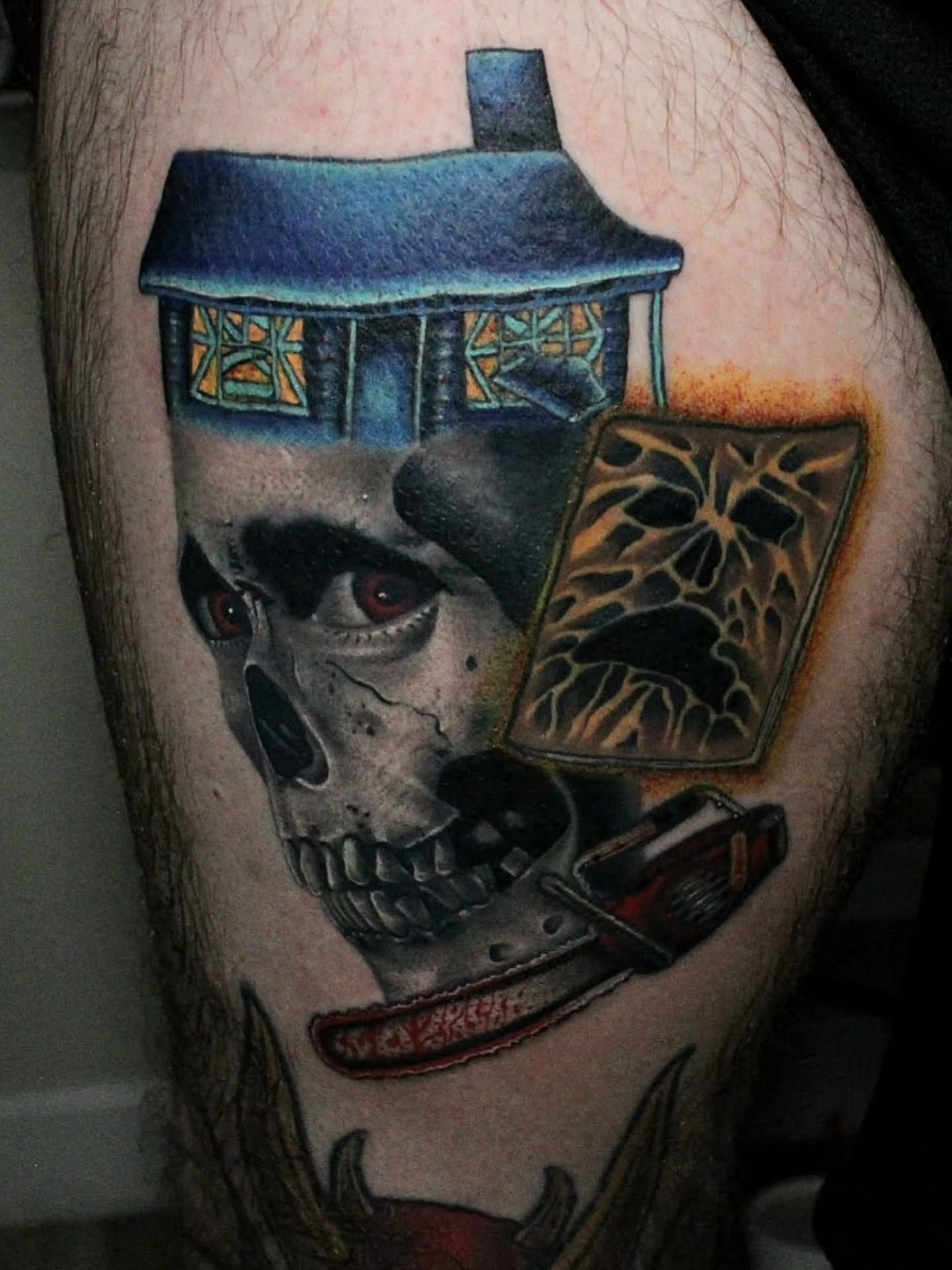Skull house dark realism tattoo on the thigh by Joey Vinci, Phoenix, Arizona