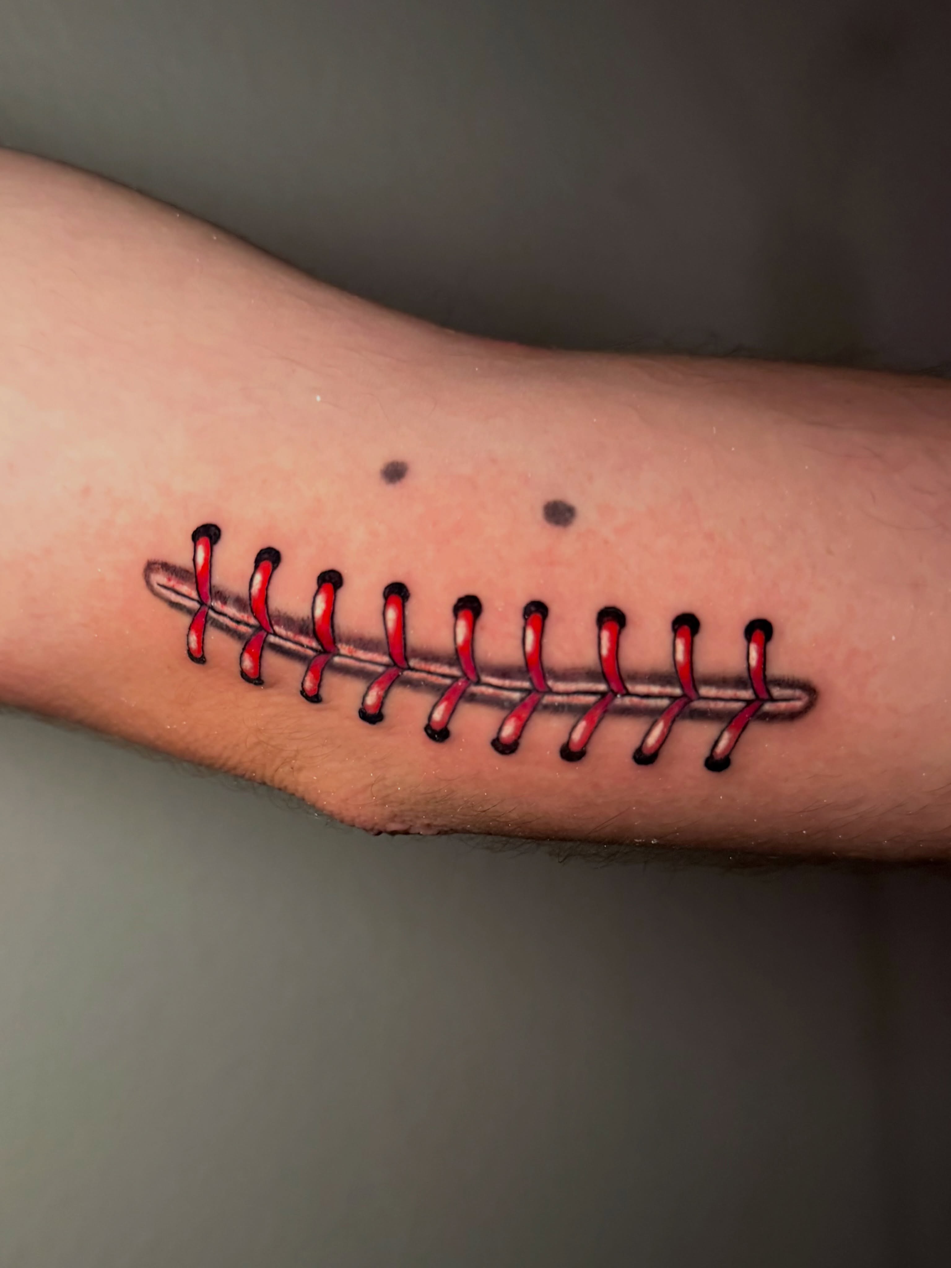 Stitch realism tattoo on the forearm by Tess