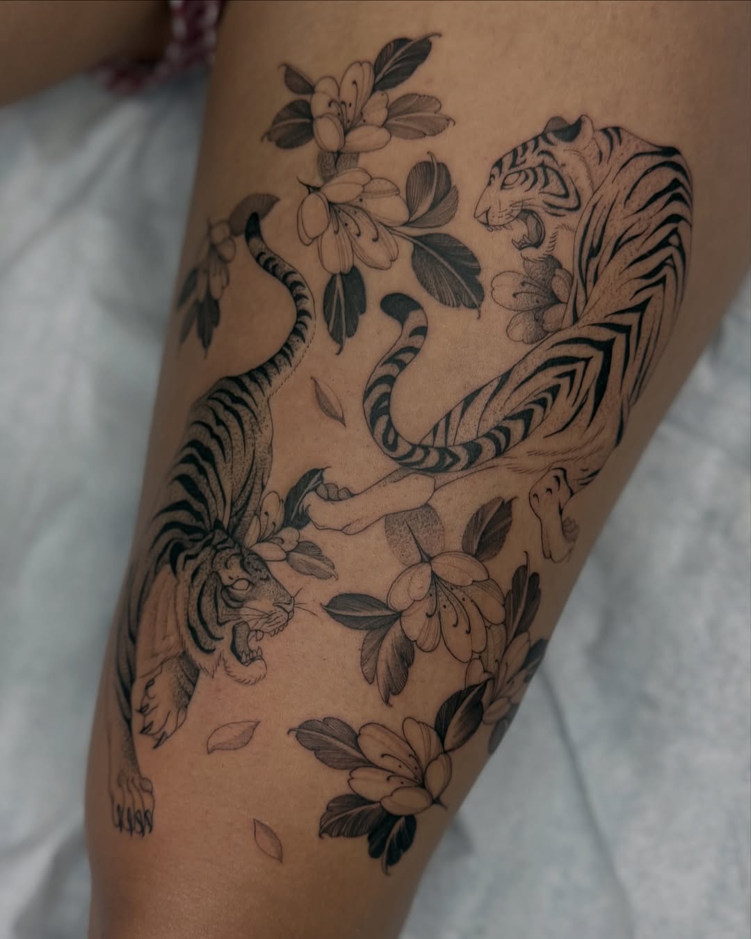 Tigers and flowers realism tattoo on the thigh by 🥀michael Ta 🥀