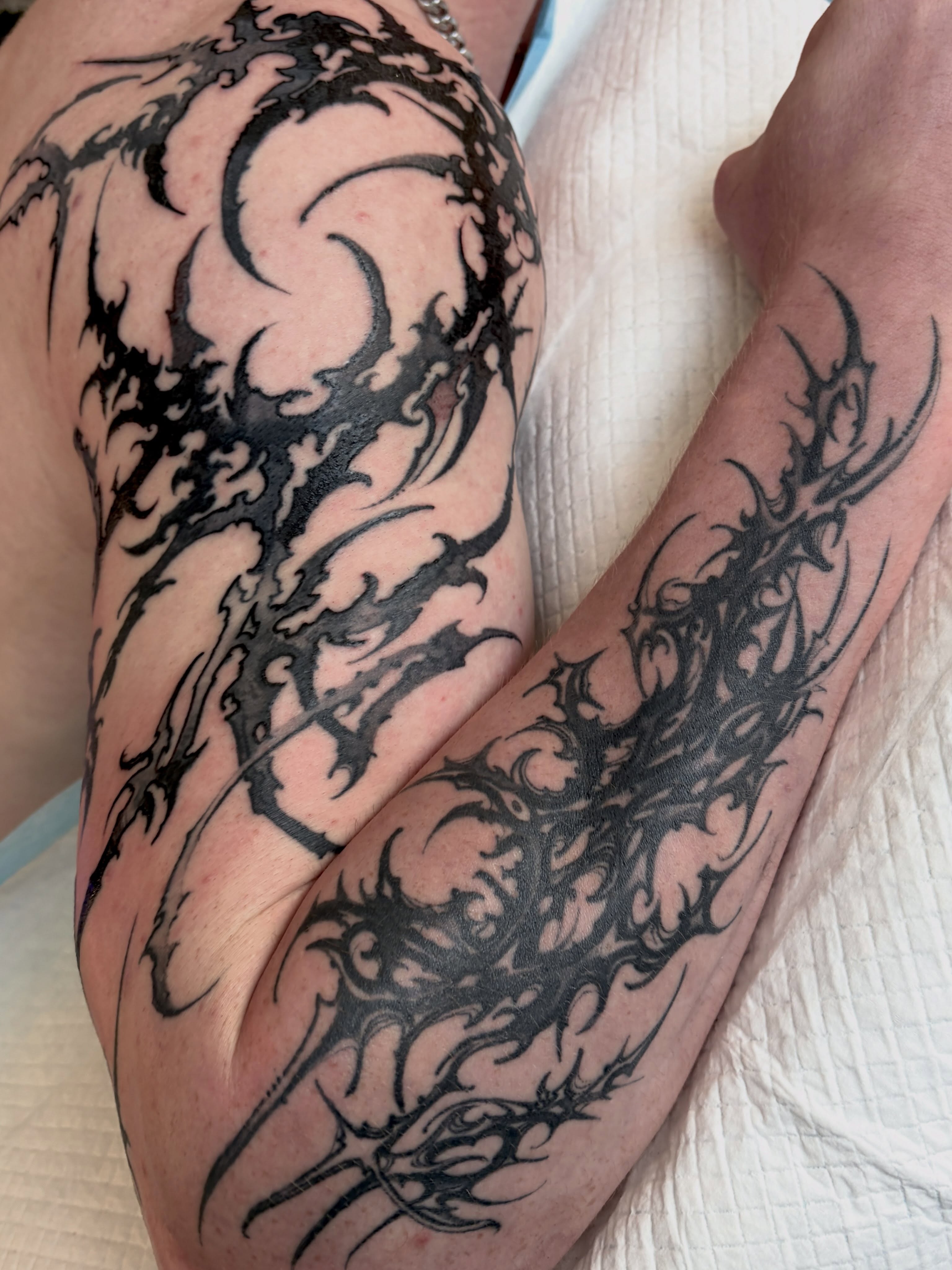 Tribal dragon tribal tattoo on the forearm by Italo Holie