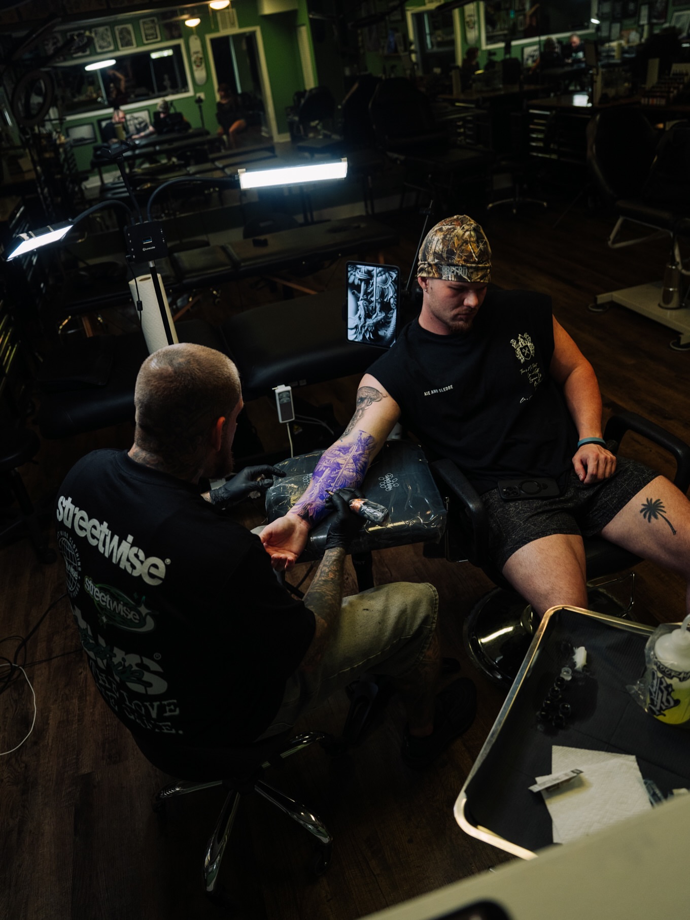 Purple floral design American traditional tattoo on the forearm by Ray Paponetti - Tattoo Artist Delray Beach