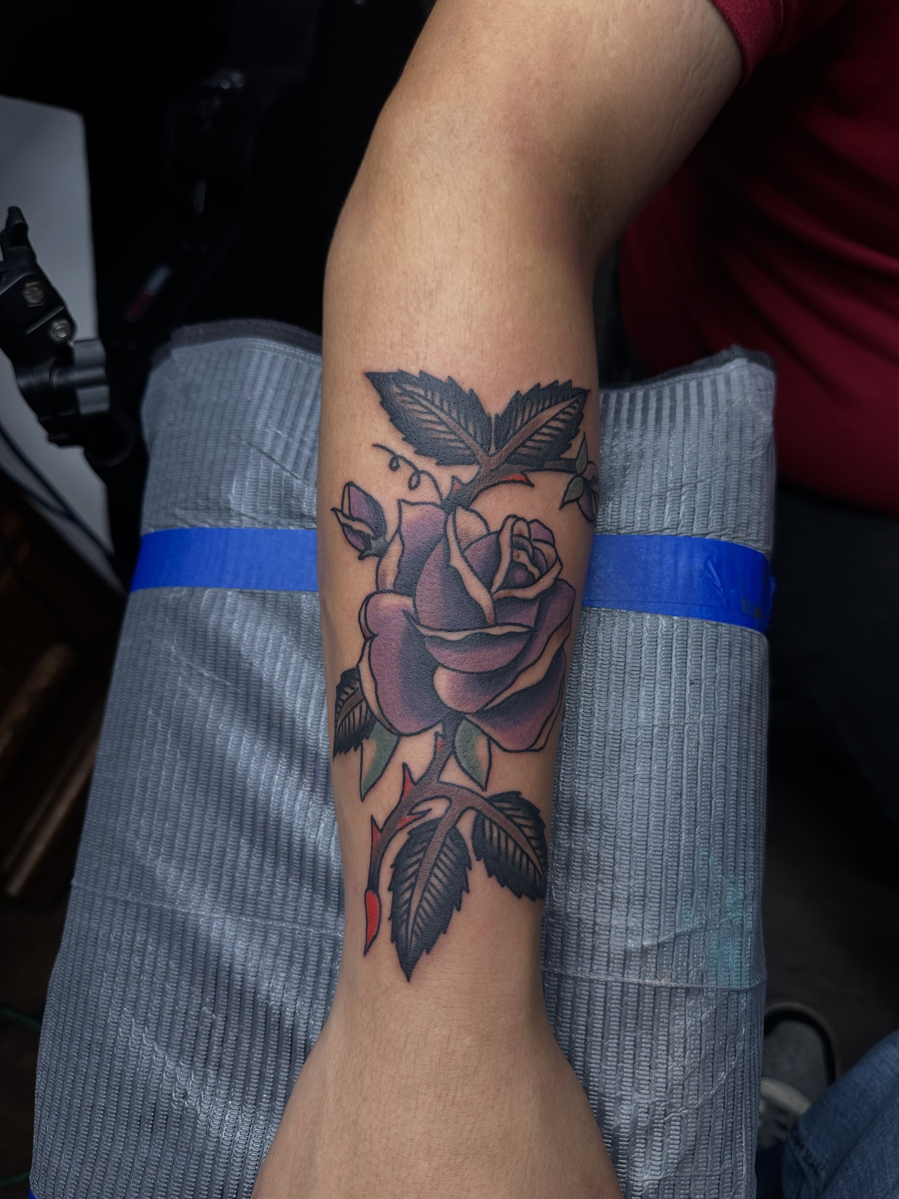 Rose realism tattoo on the forearm by Stephen Galena