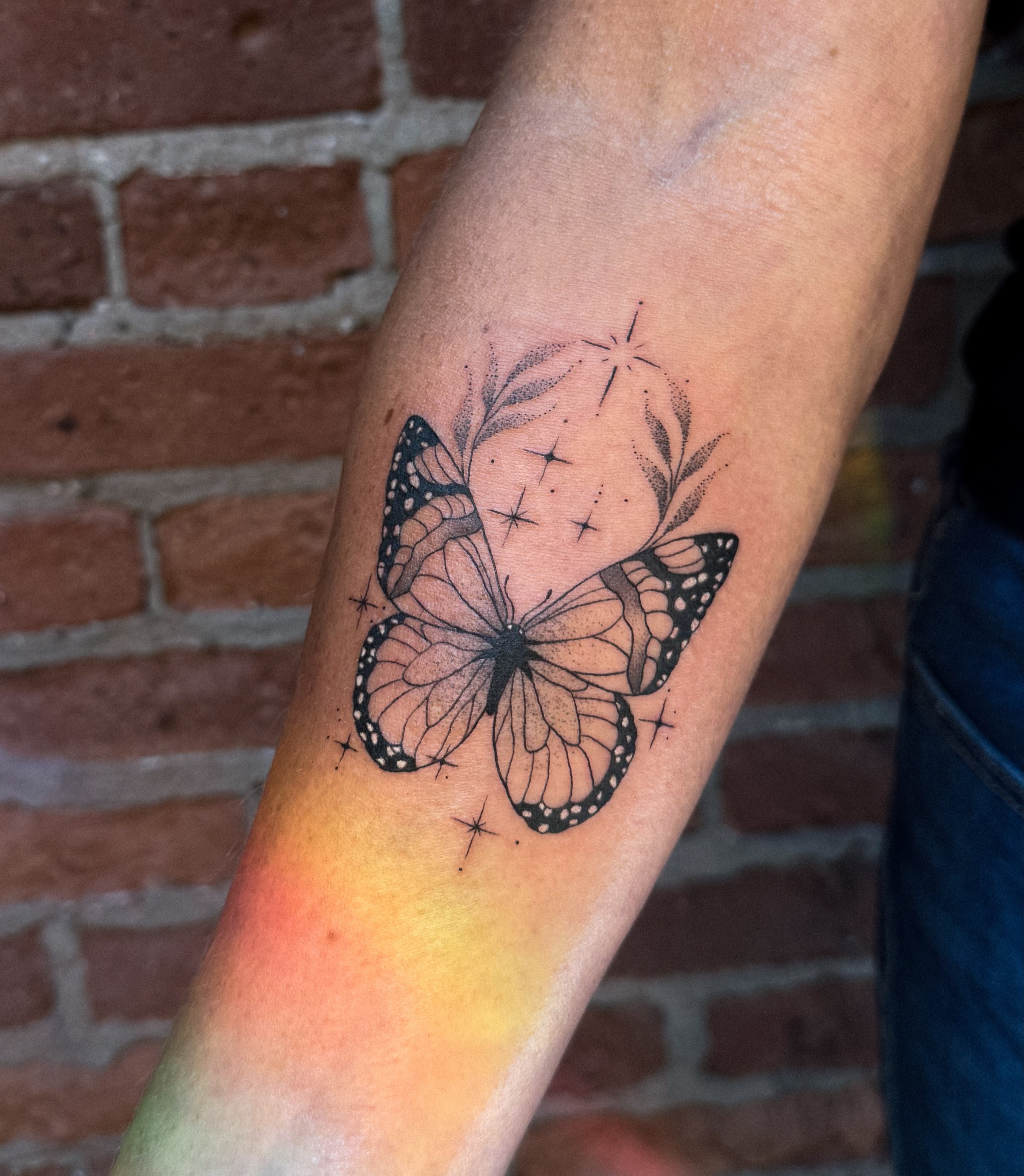 Butterfly dotwork tattoo on the forearm by Jessica Bloom