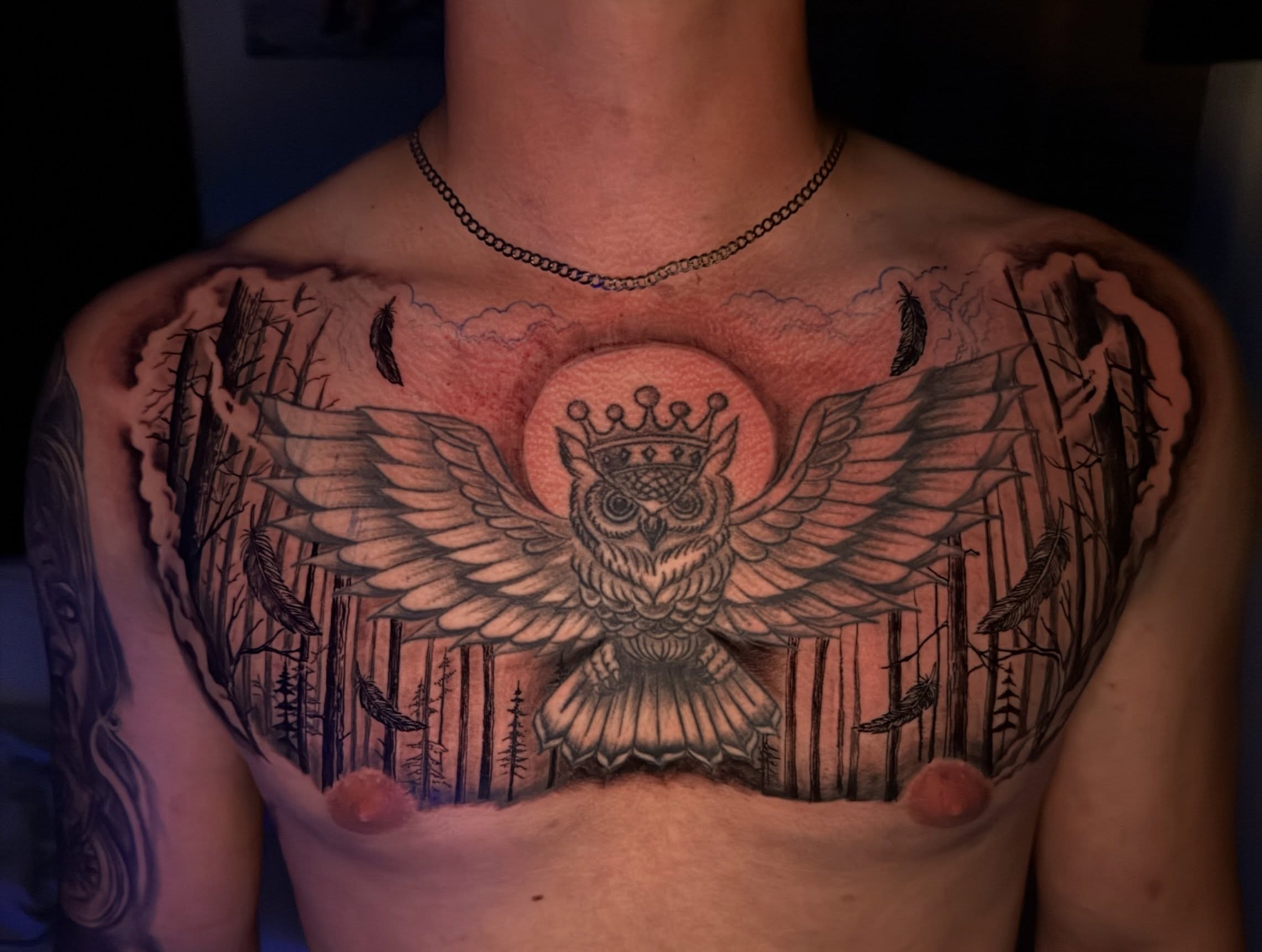 Owl with crown black and grey tattoo on the chest by Aldocasales@tatto