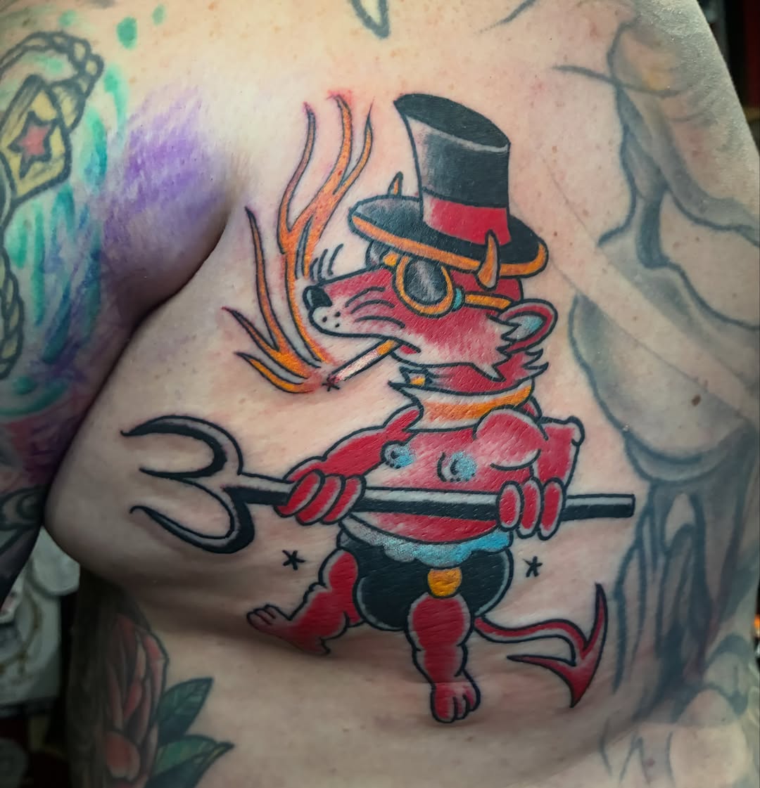 Fox with trident American traditional tattoo on the chest by Joey Knuckles