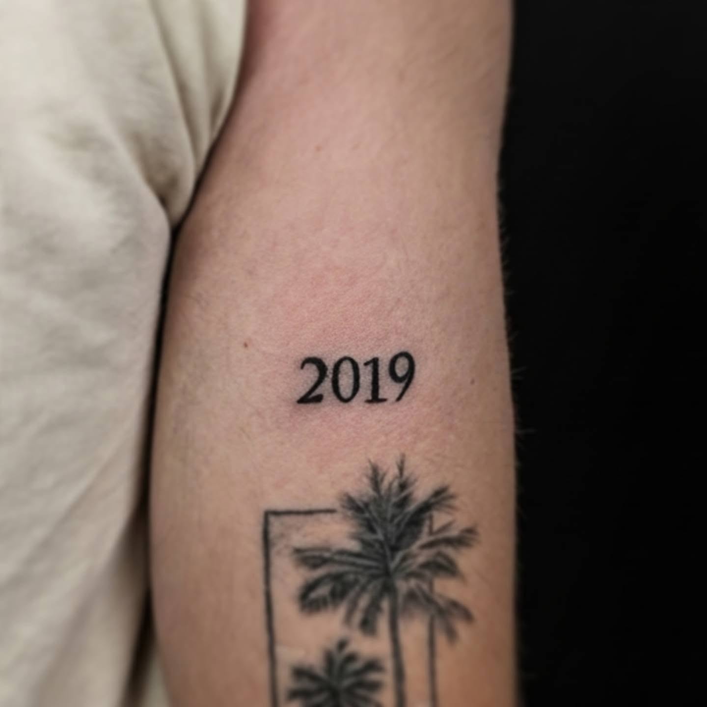 2019 black and grey tattoo on the forearm by Tony