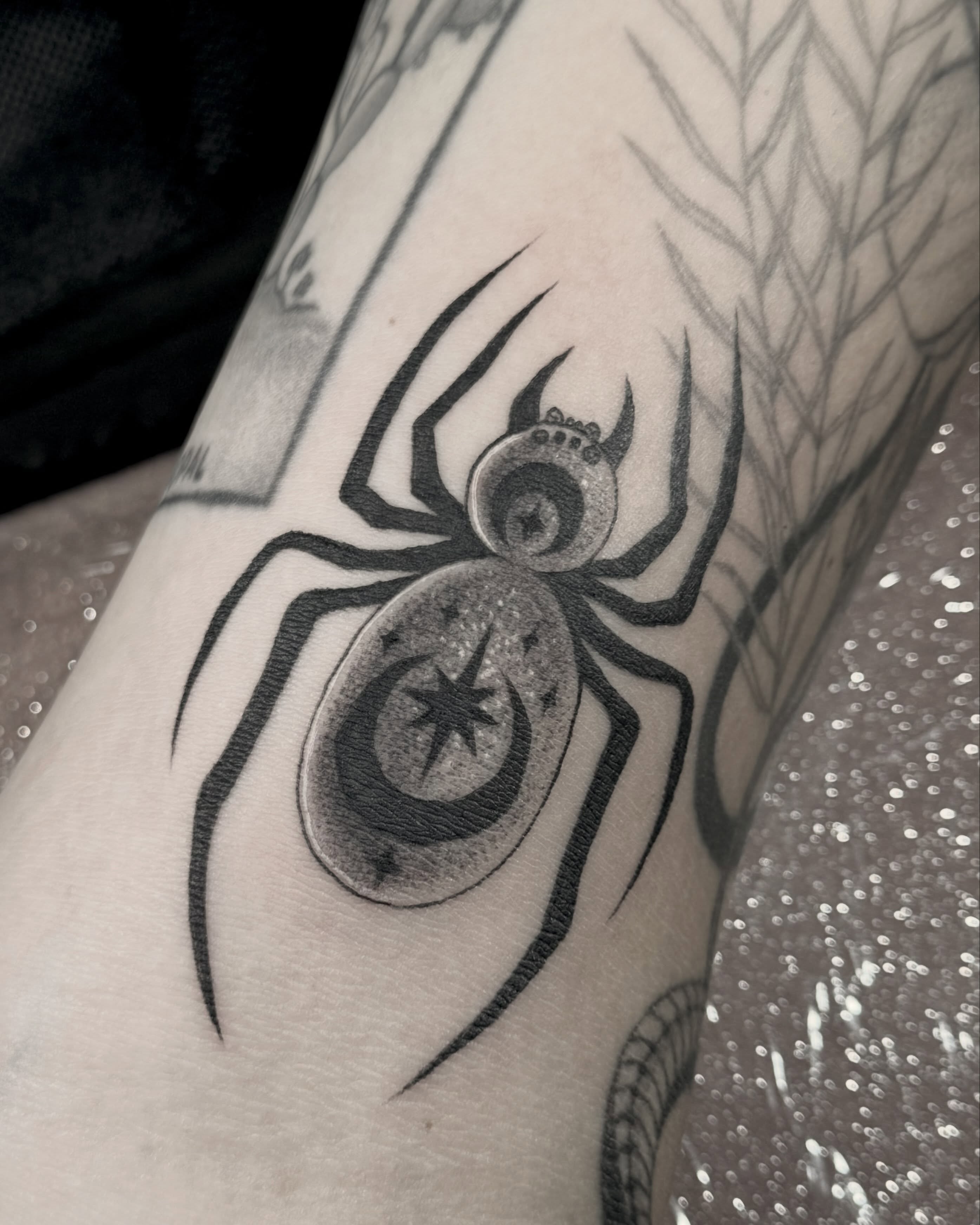 Spider black and grey tattoo on the forearm by Christian