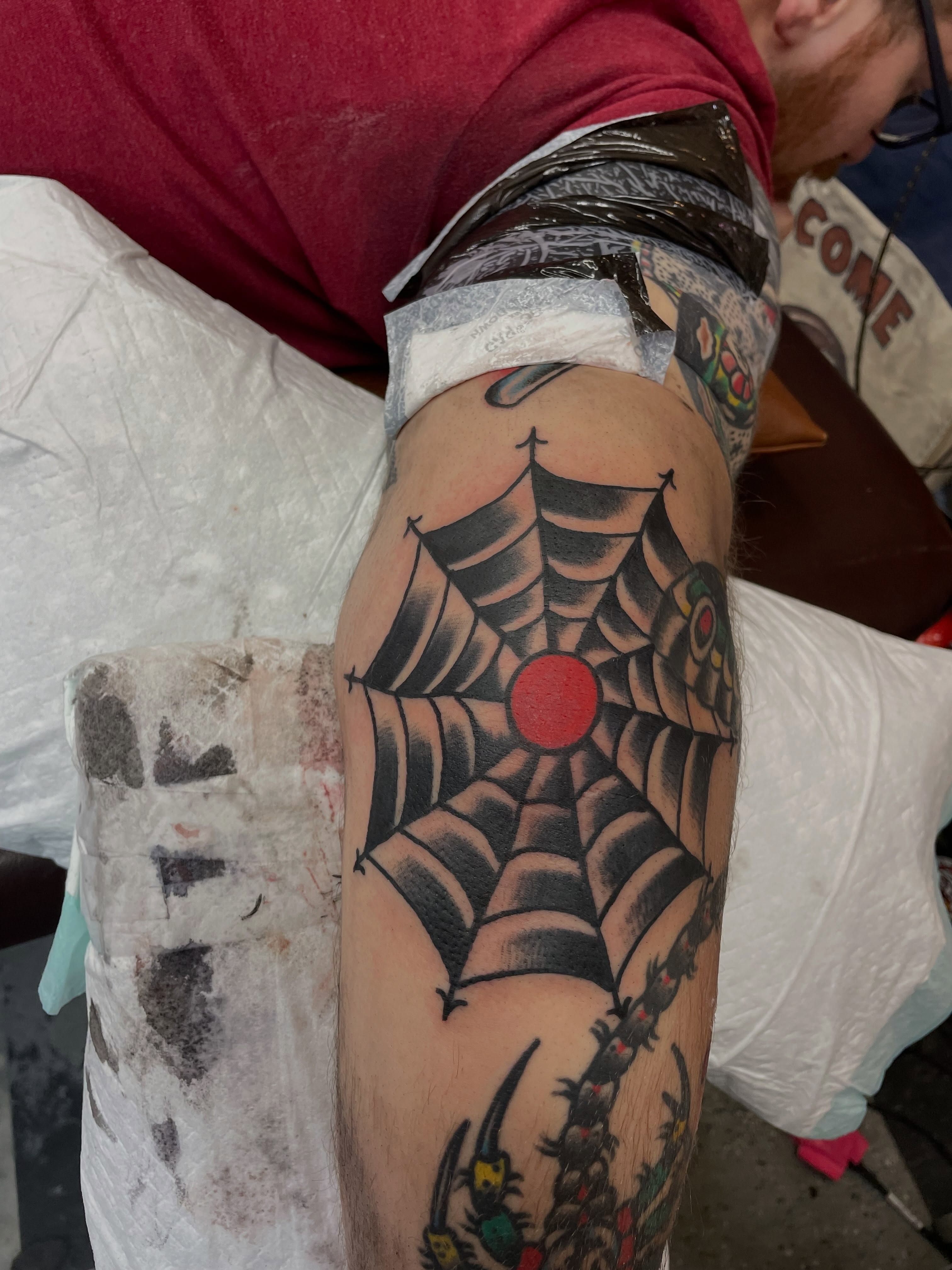 Spider web American traditional tattoo on the forearm by dave rash