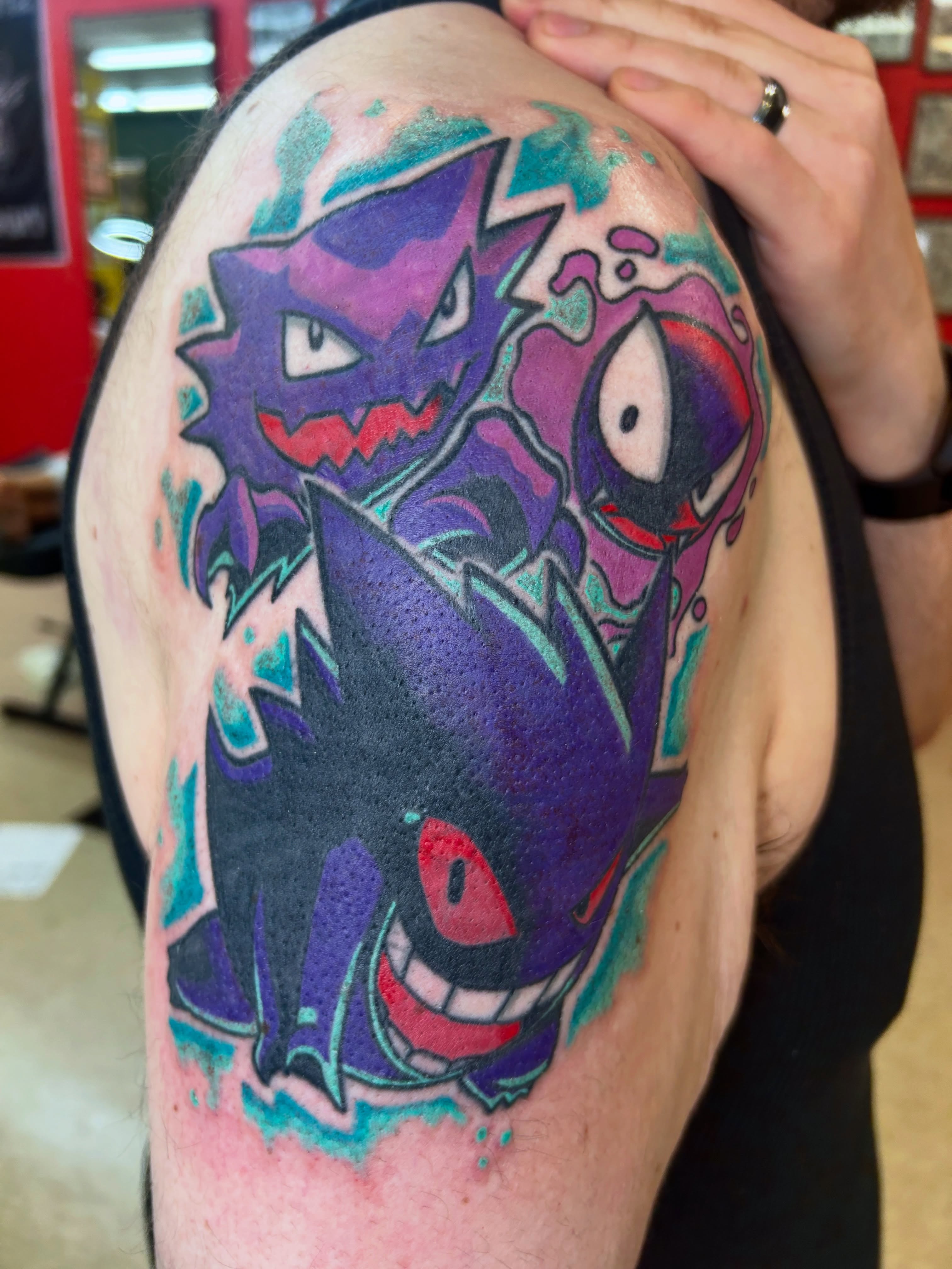 Gengar watercolor tattoo on the shoulder by Dylan James