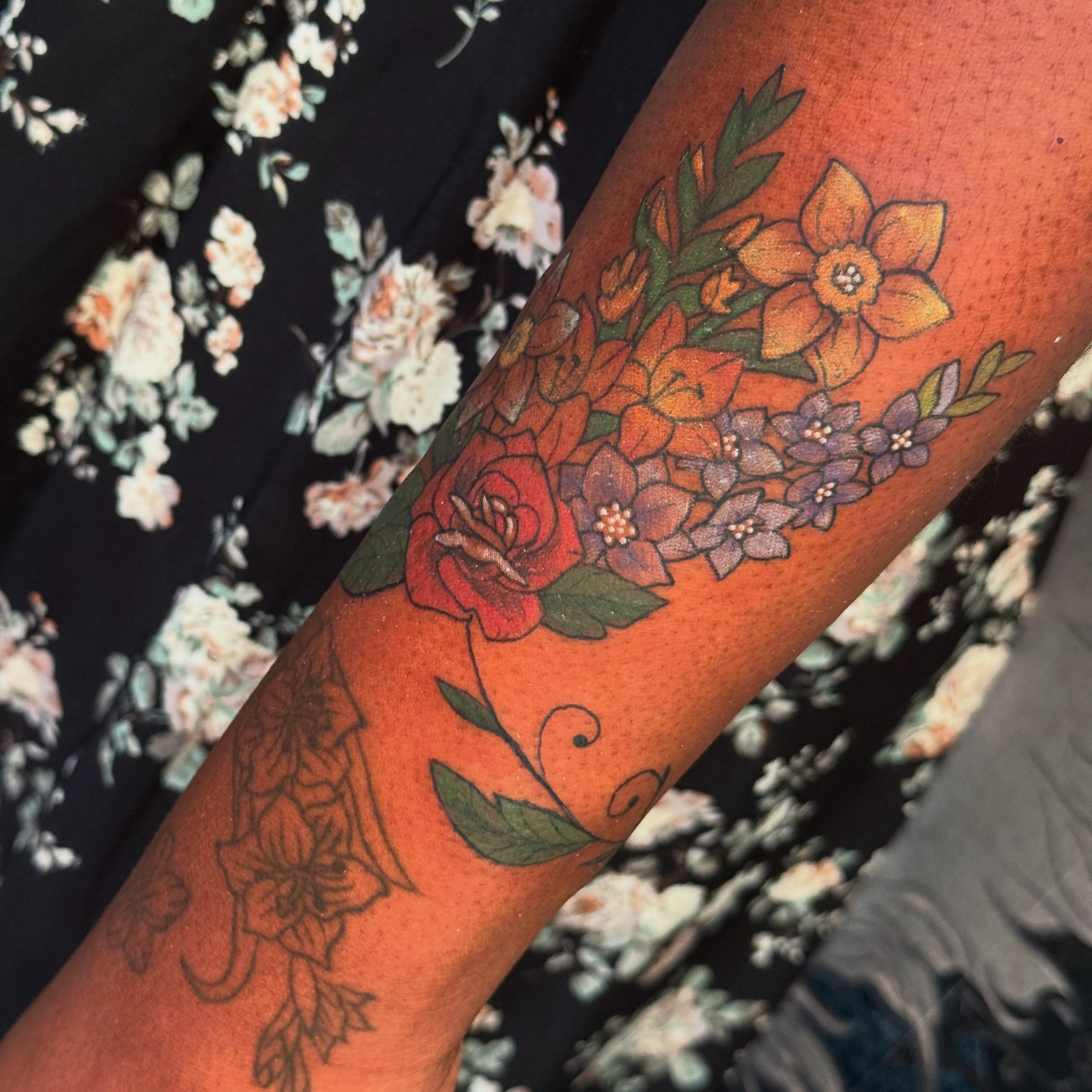 Floral bouquet new school tattoo on the forearm by liam u. williams