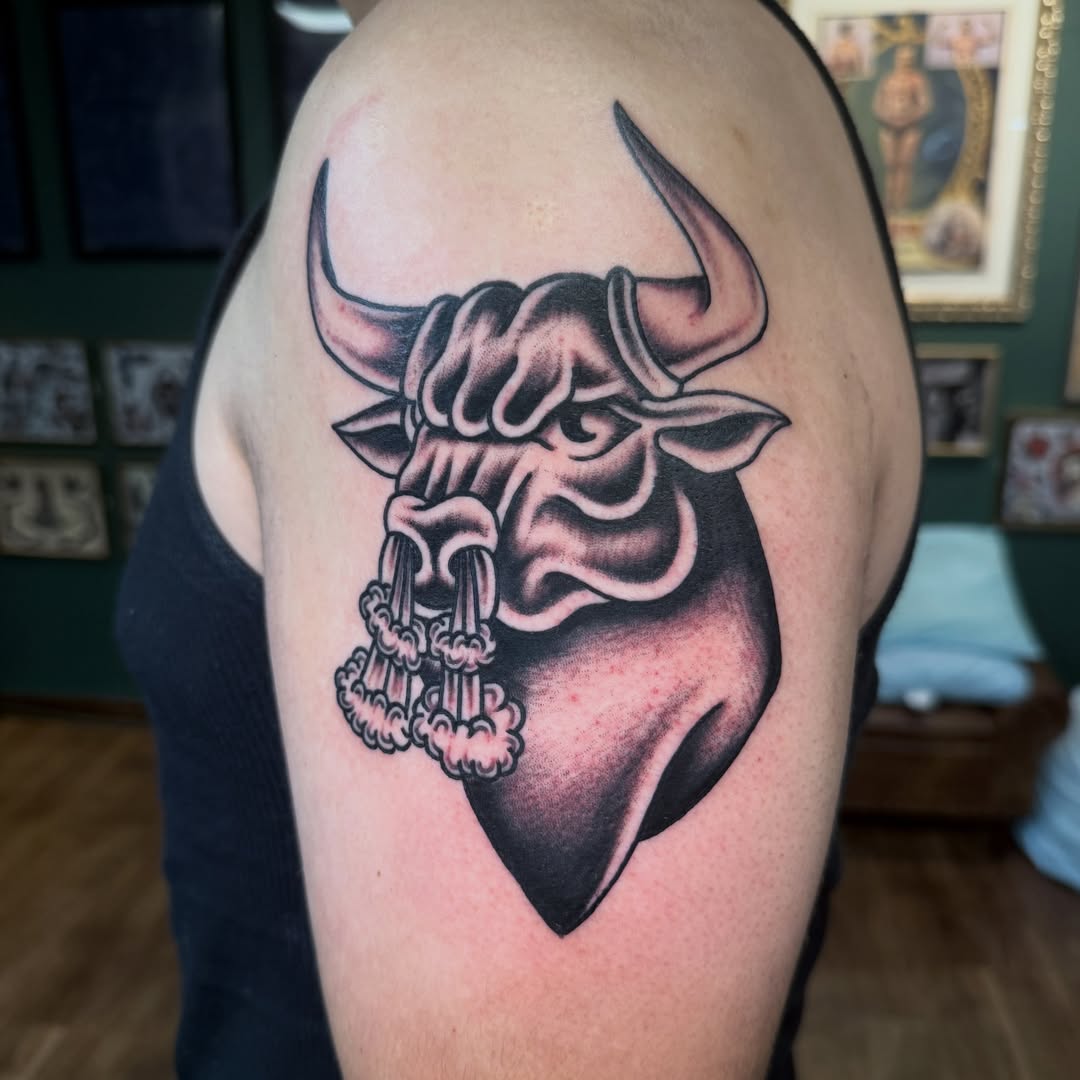 Bull head black and grey tattoo on the shoulder by Ryan Moraski, Colorado Springs, Colorado