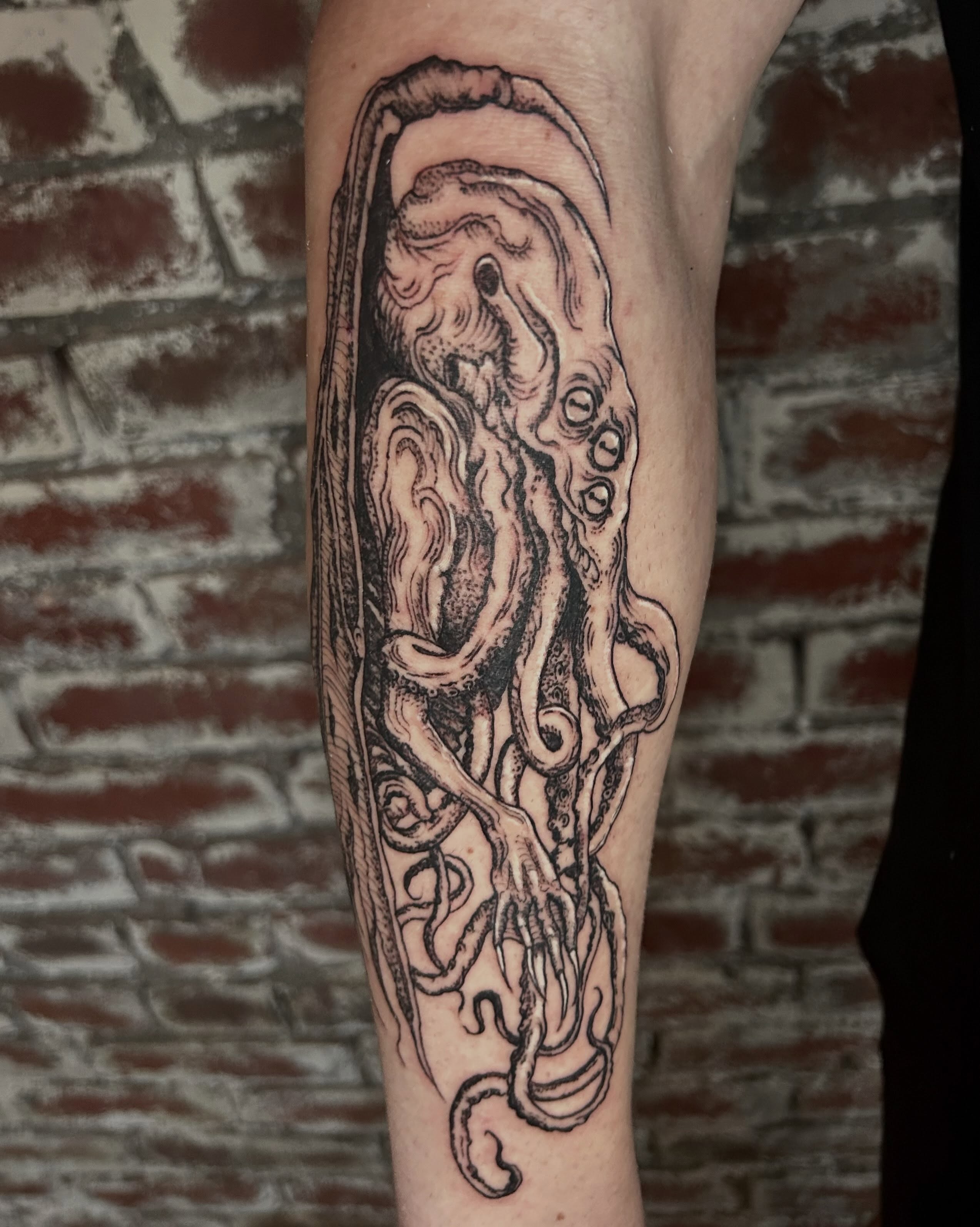 Octopus black and grey tattoo on the forearm by ๐๐๐๐๐๐ ๐๐๐๐๐๐ ๐๐๐๐๐๐