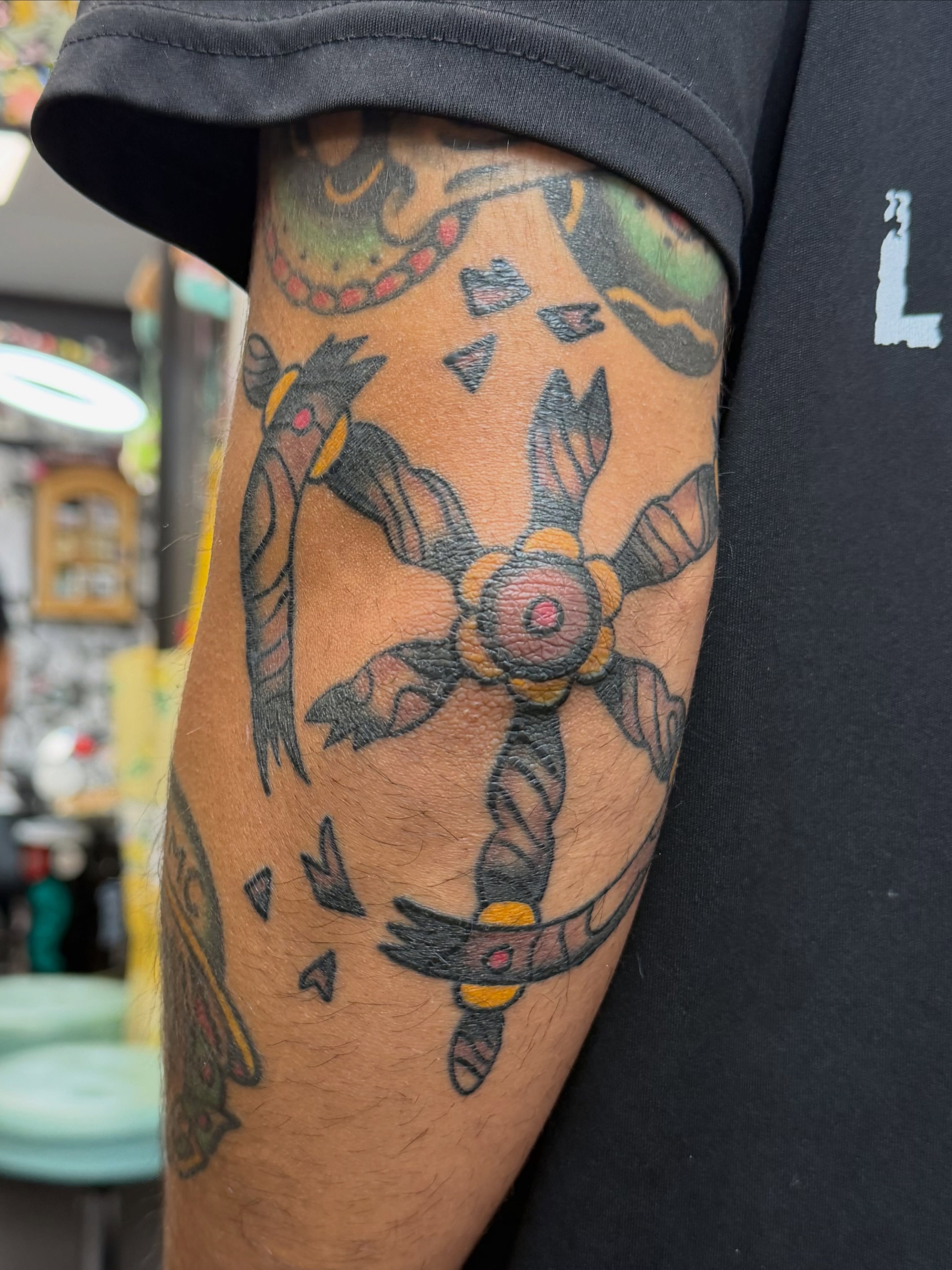 Geometric star geometric tattoo on the forearm by Carl Testi
