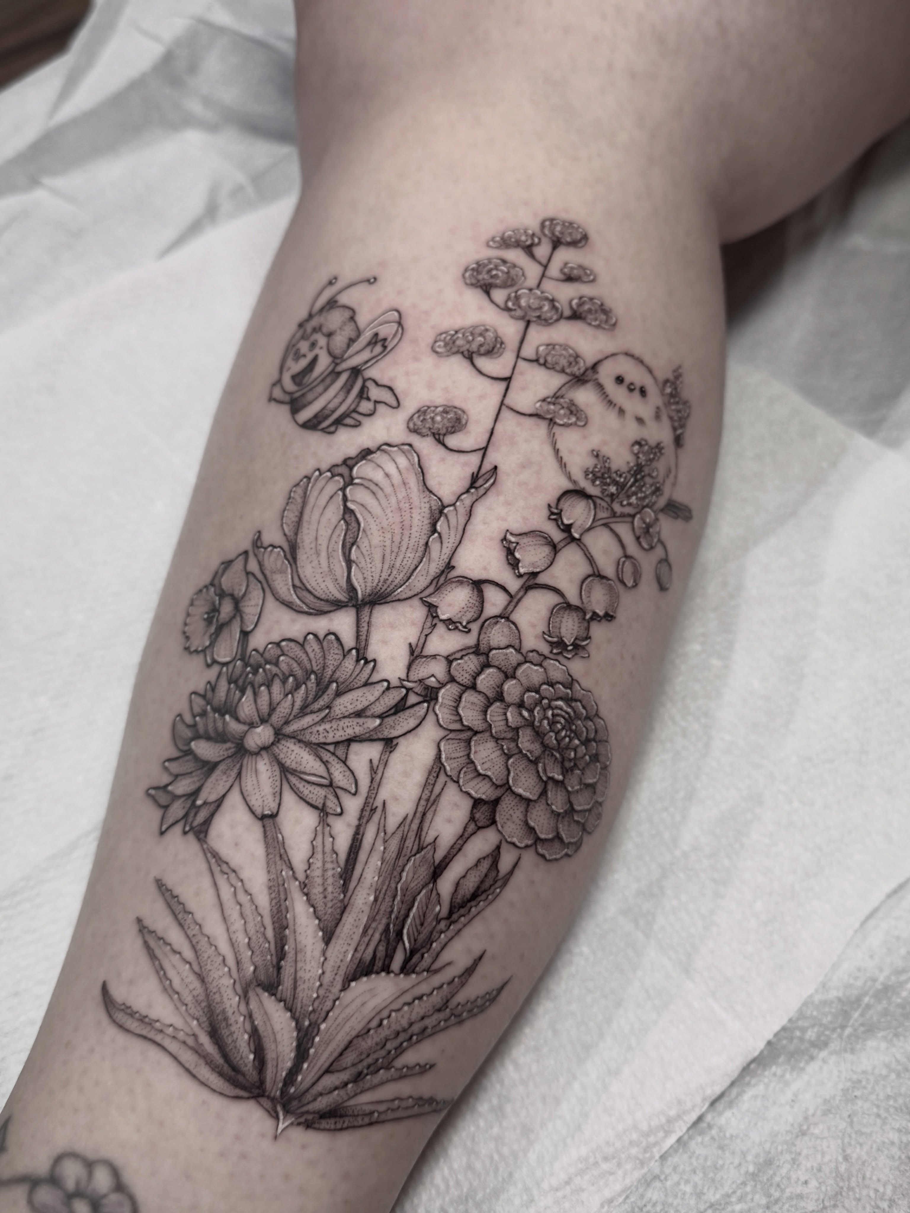 Botanical bouquet realism tattoo on the forearm by Tattoos by Robyn Pallotta, Austin, Texas