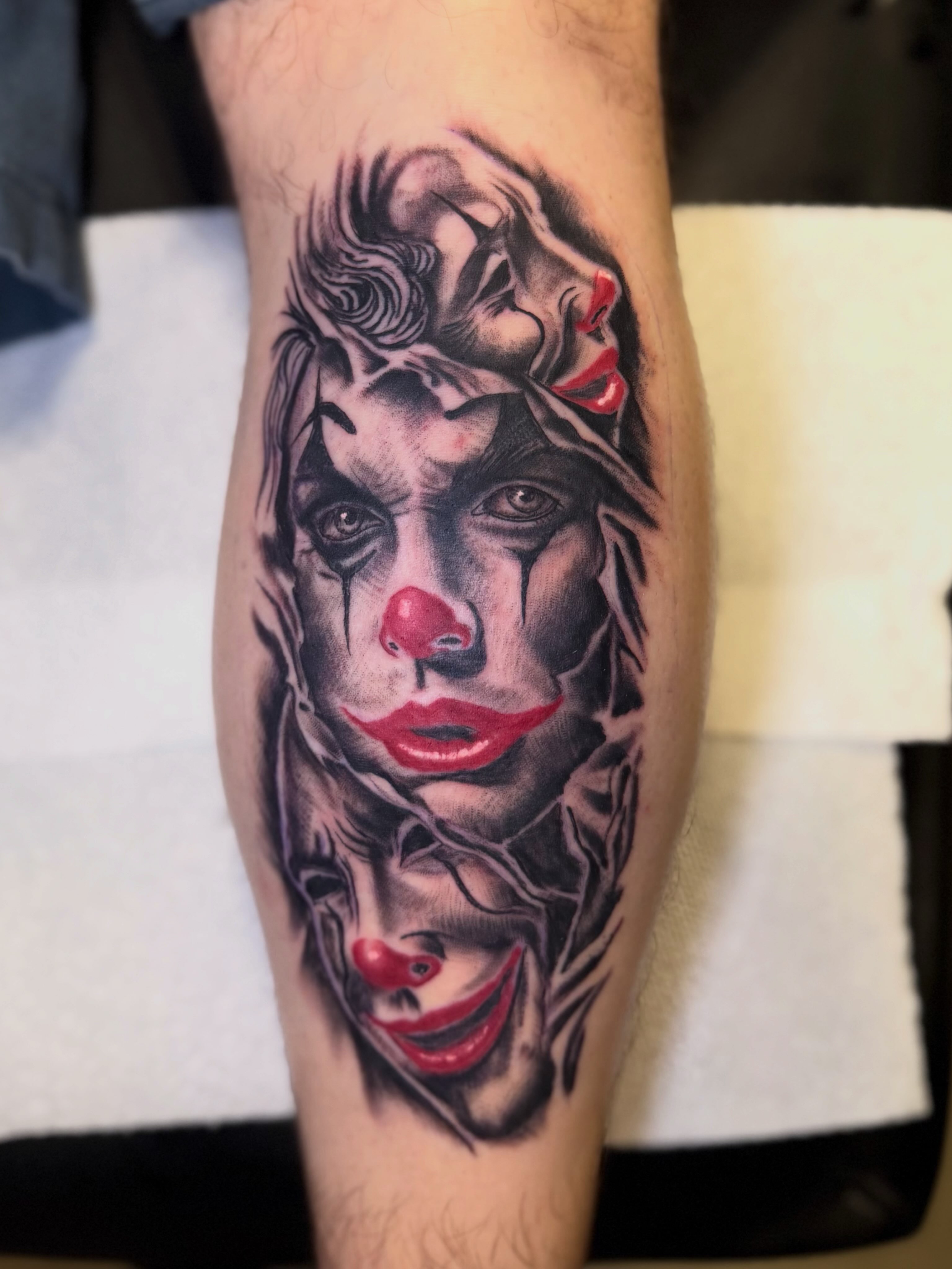 Clown face realism tattoo on the forearm by Zeninkz