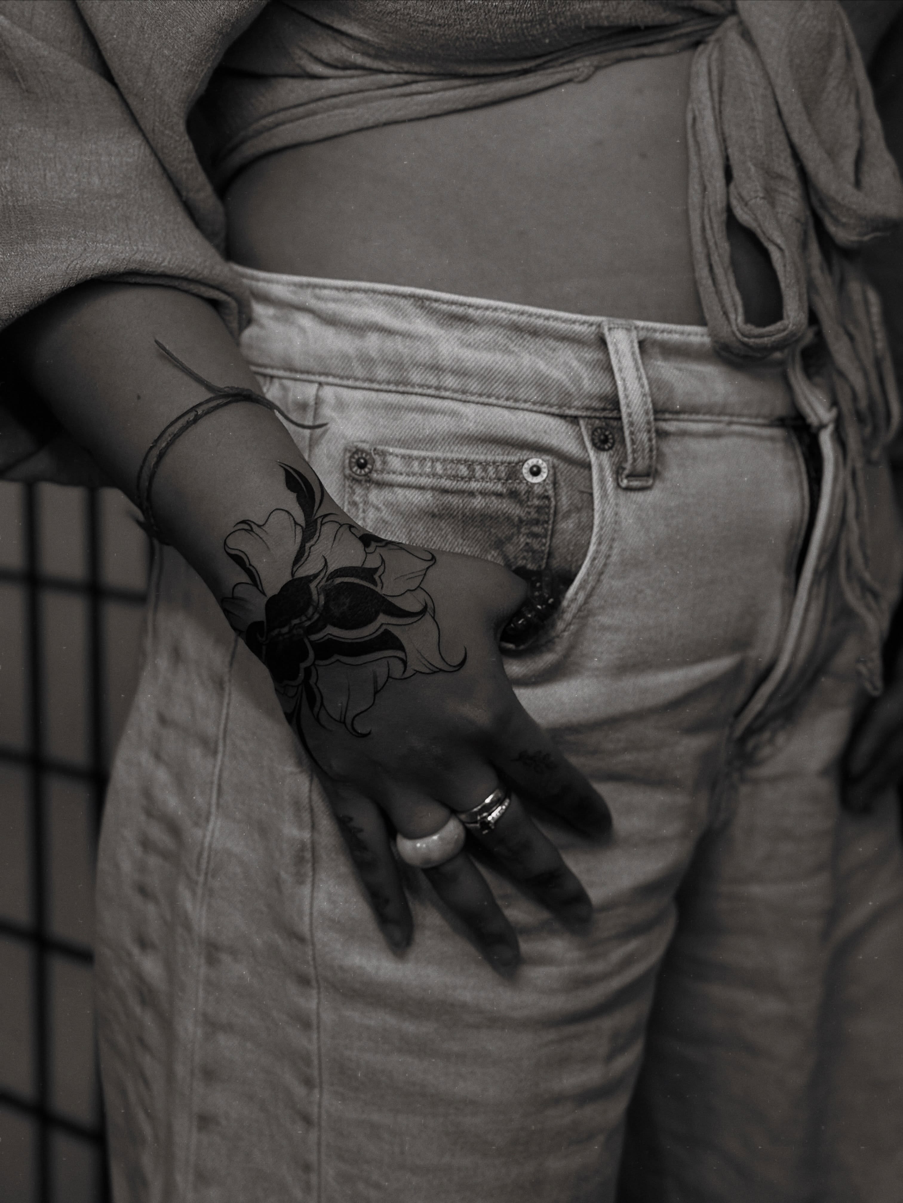 Flower black and grey tattoo on the hand by MISO ⟡ Bay Area Tattoo Artist