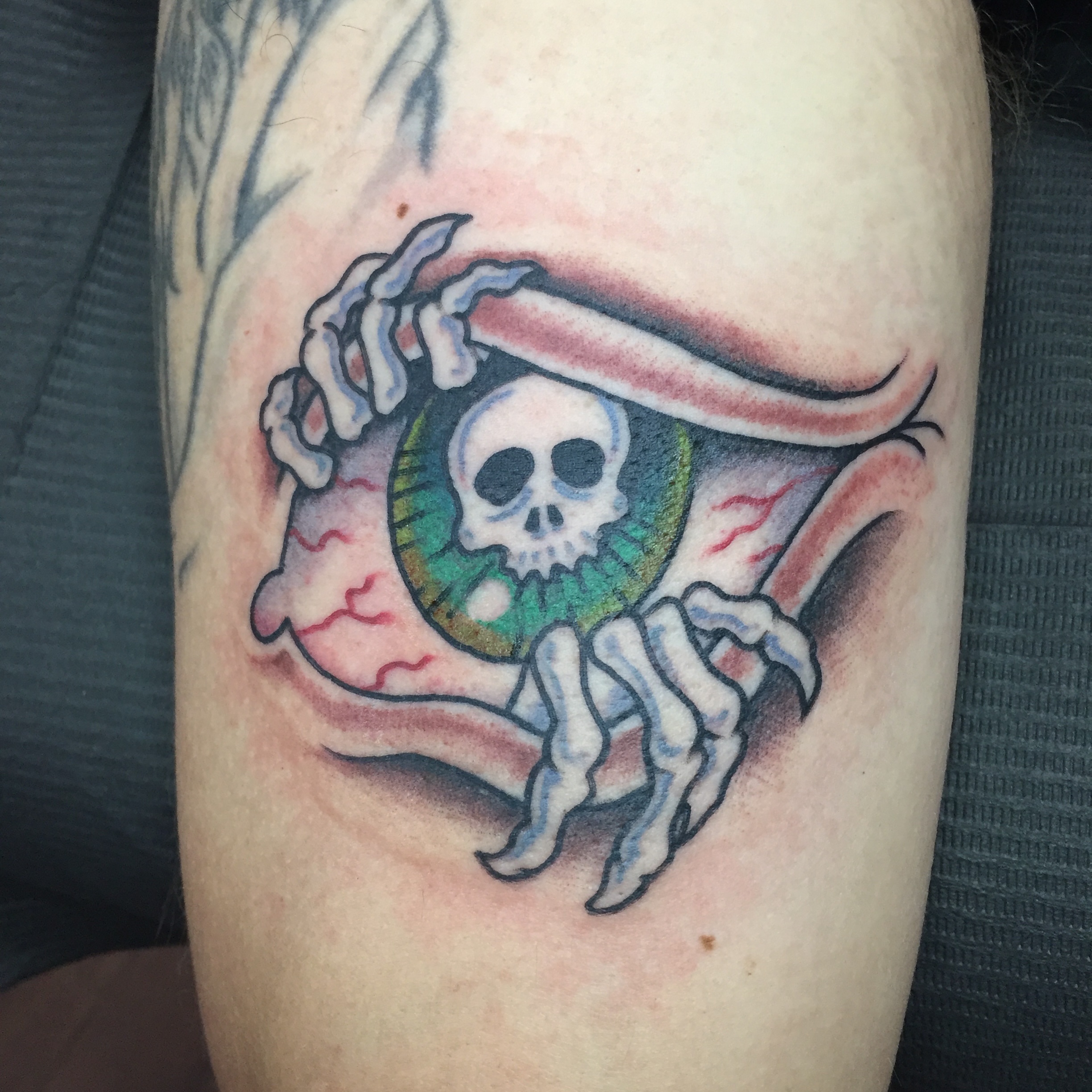 Eye with skull neo-traditional tattoo on the forearm by Ramsie Segura-Andrews