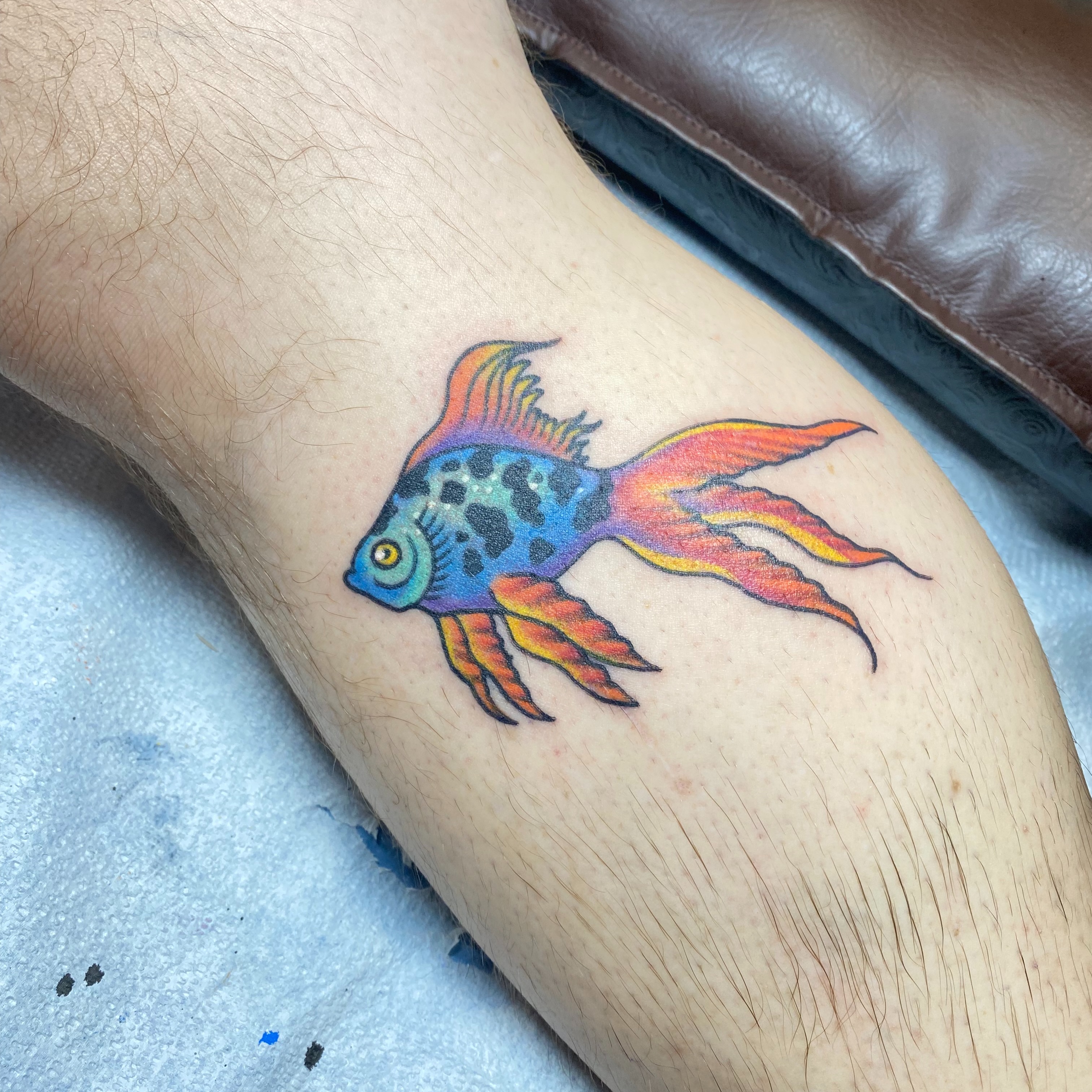 Fish new school tattoo on the forearm by Ramsie Segura-Andrews