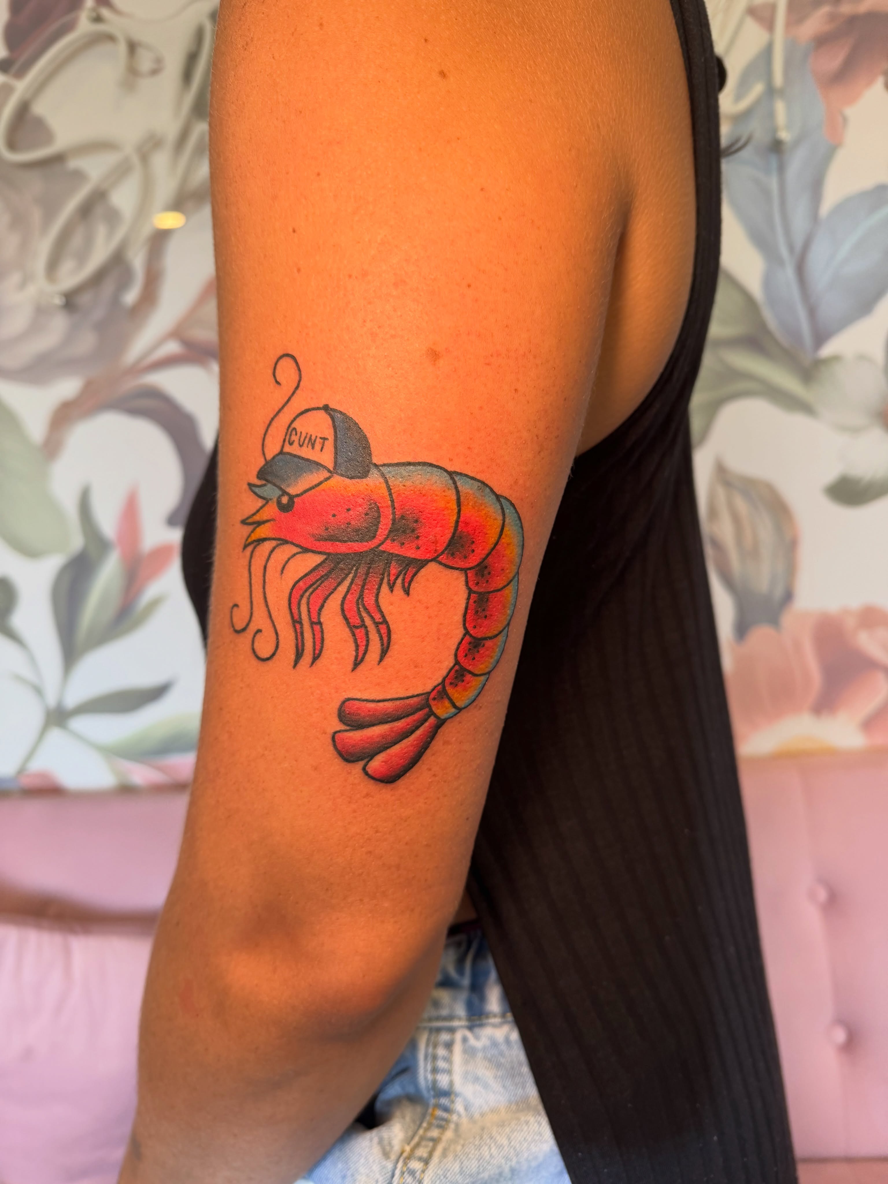 Lobster wearing cap new school tattoo on the forearm by Kinzi Brown