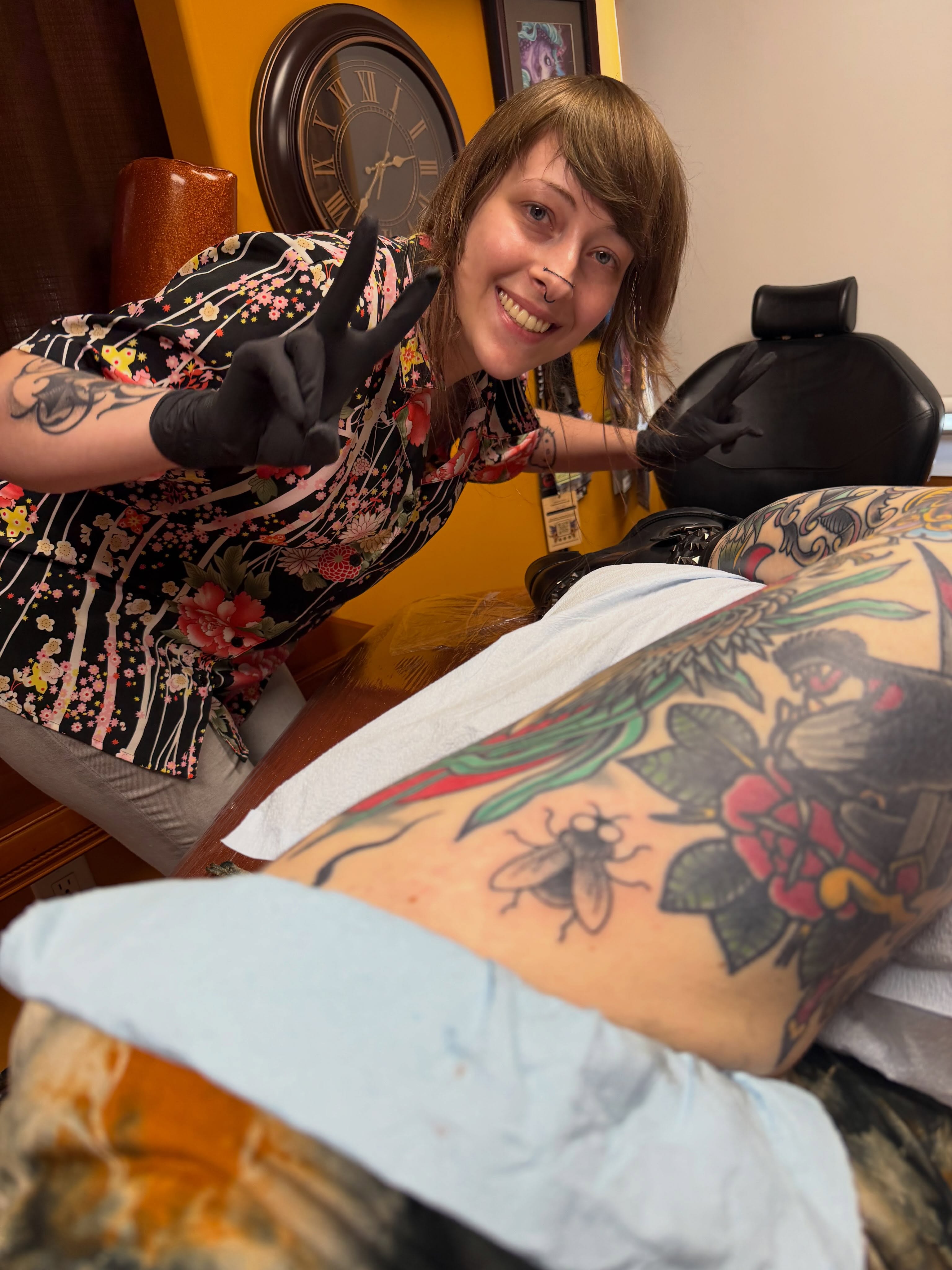 Bee and flower American traditional tattoo on the thigh by Kelsea Weir McCree