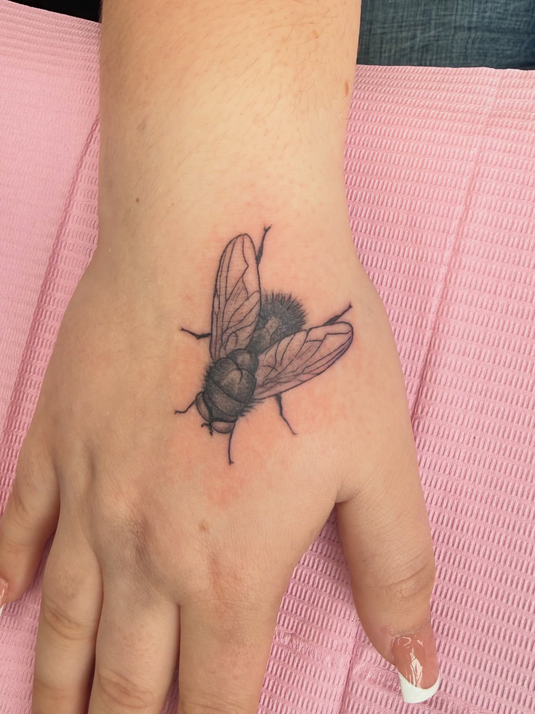 Fly realism tattoo on the hand by Ricky Sanchez, Duncanville, Texas