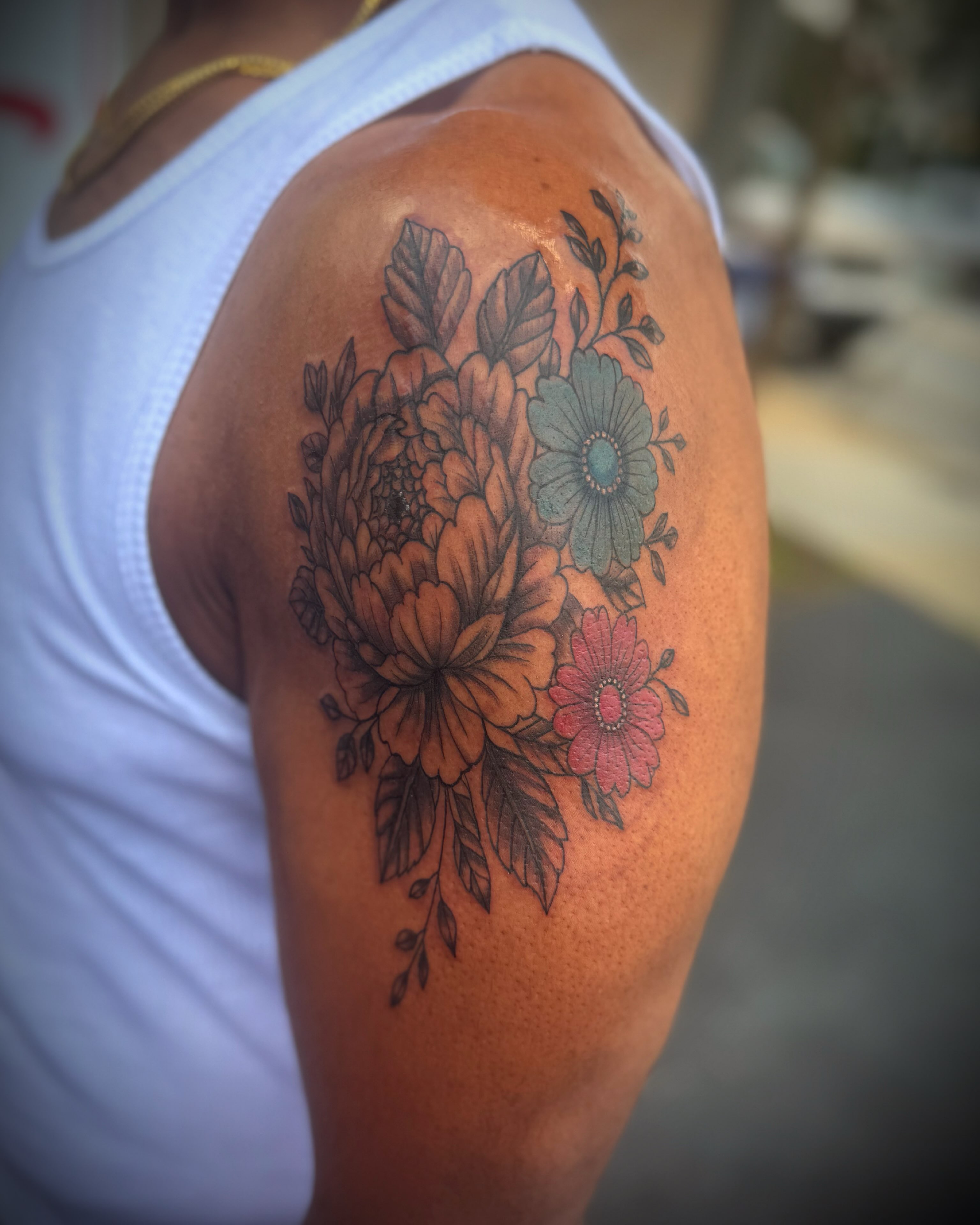 Floral bouquet black and grey tattoo on the shoulder by Chris Adkins Tattoos, Chattanooga, Tennessee
